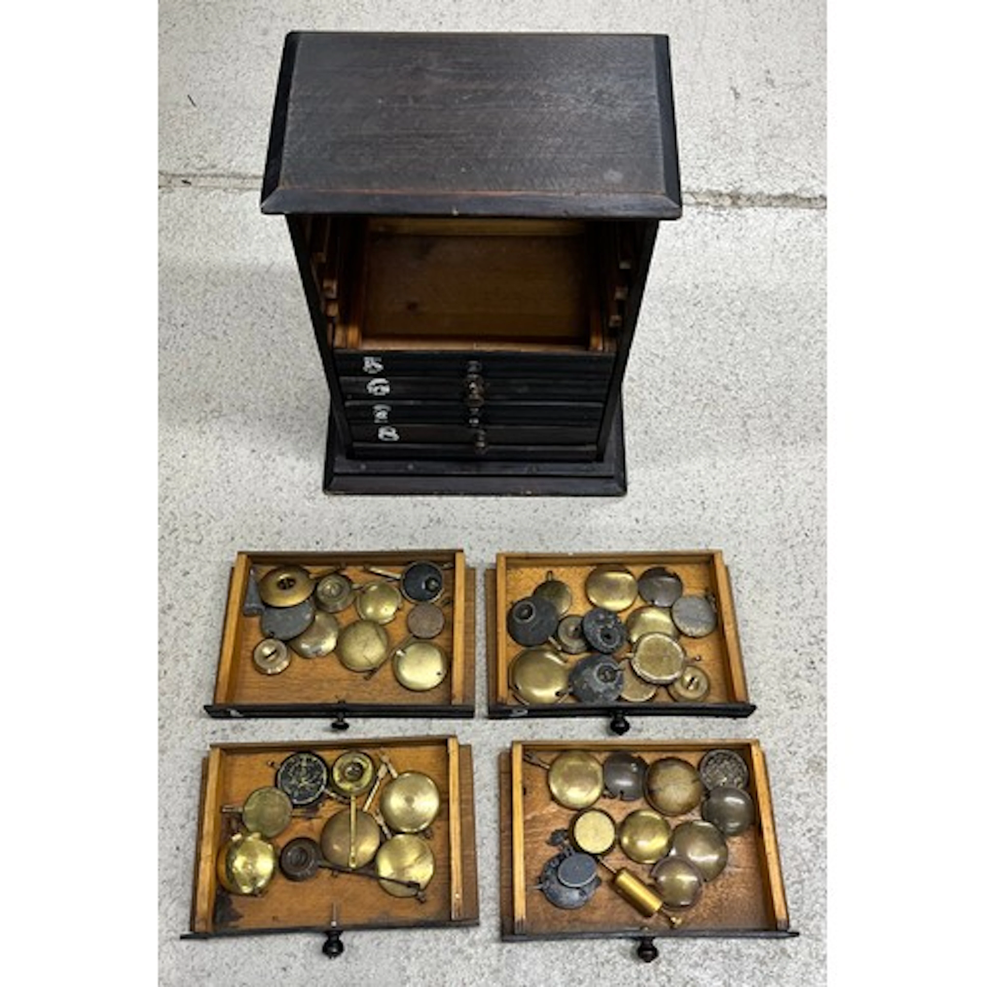 Eight drawer wooden storage chest containing a quantity of a...
