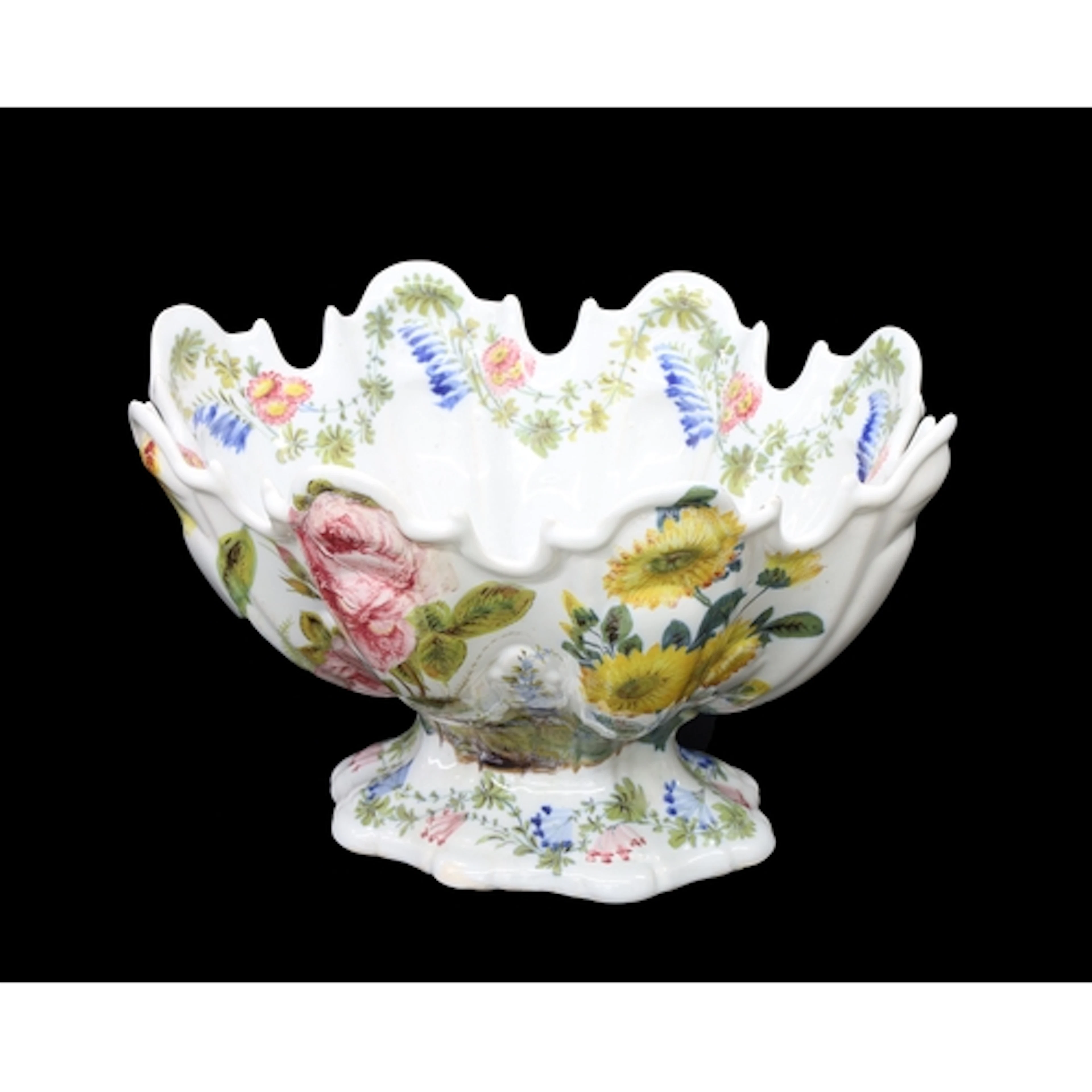 Italian maiolica centrepiece, boldly decorated with colourfu...