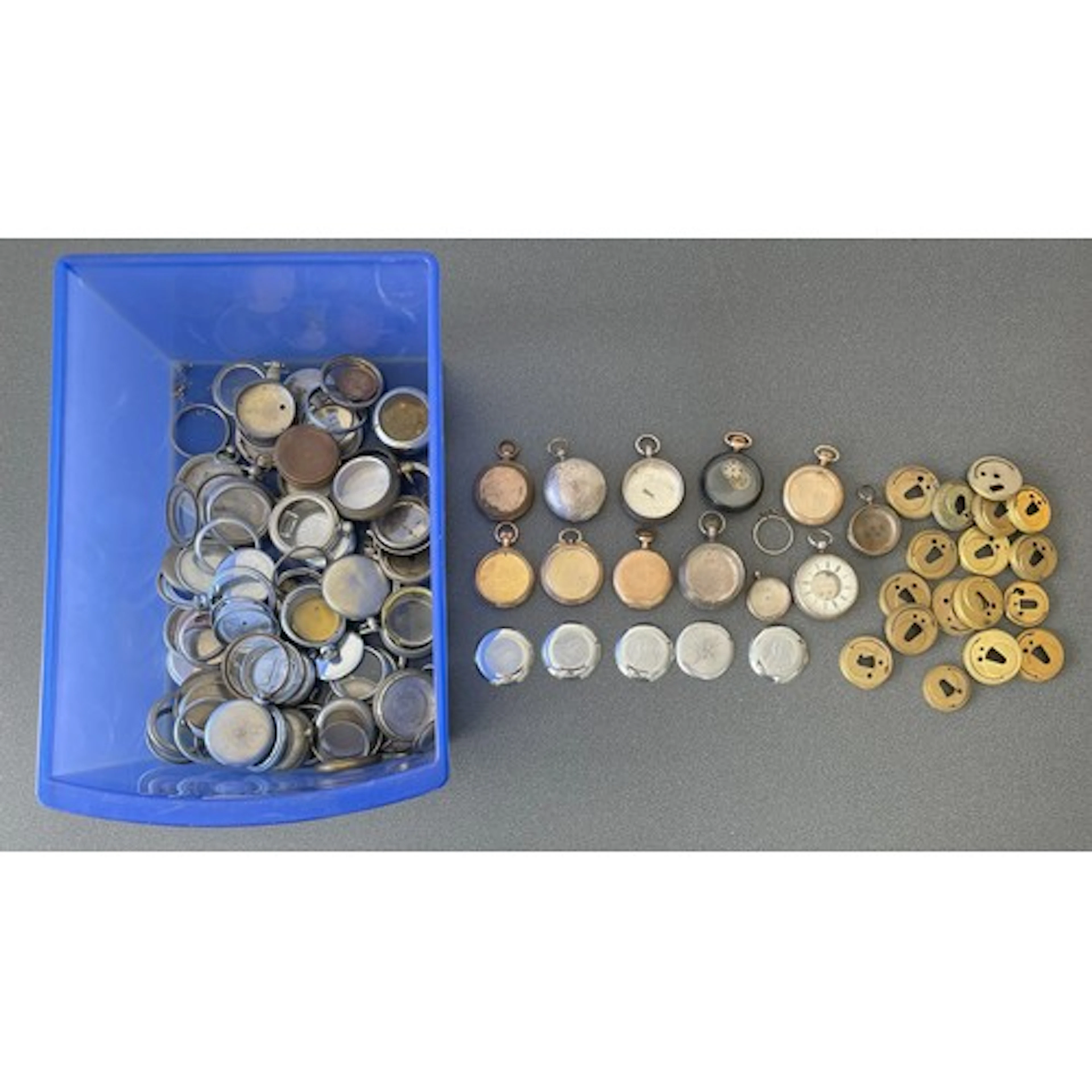 Five gold plated pocket watch cases including a hunter examp...