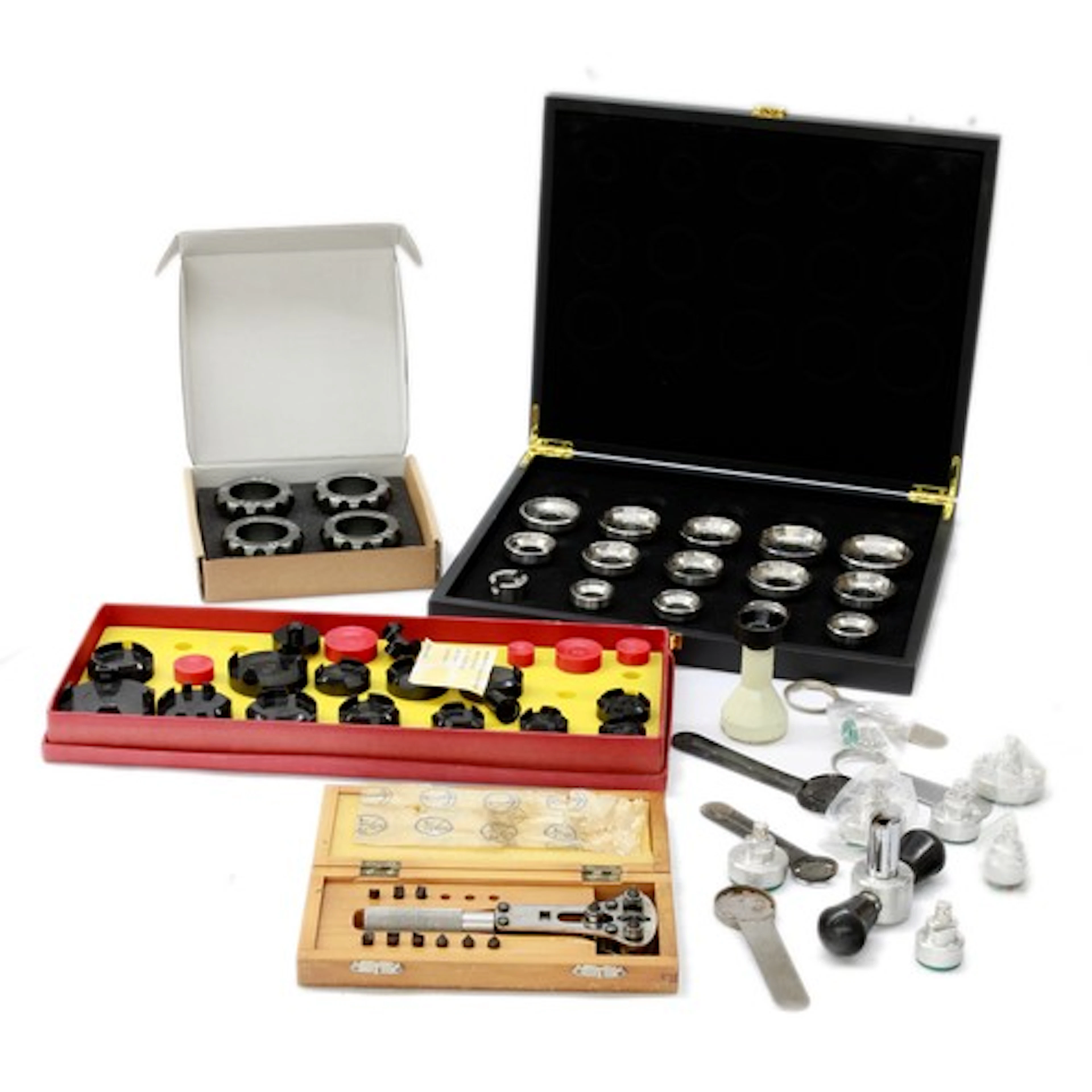 Quantity of various watch case opening tools to include Omeg...