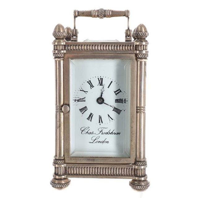Miniature silver carriage clock timepiece, the Roman numeral...