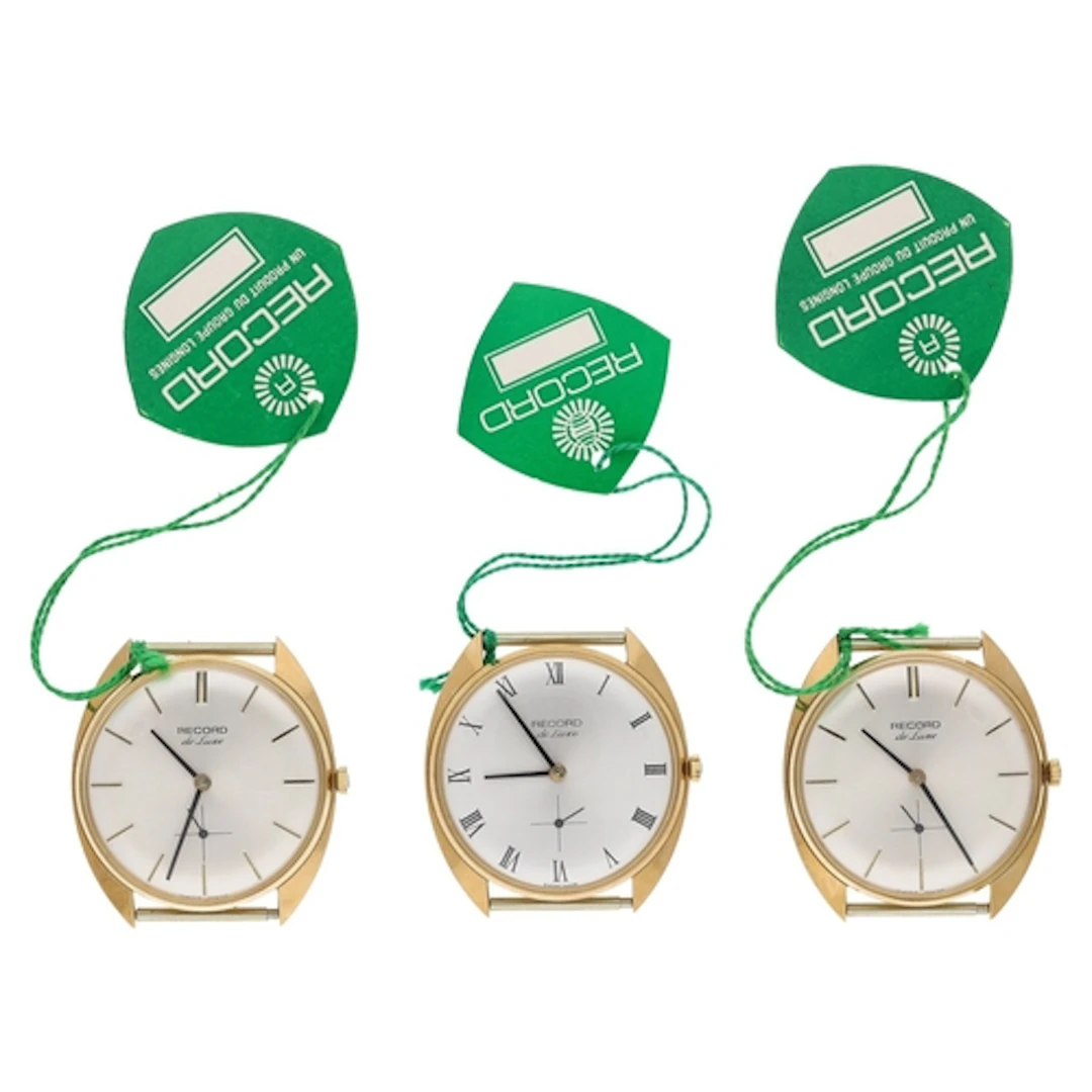 Three Record De Luxe gold plated and stainless steel gentlem...