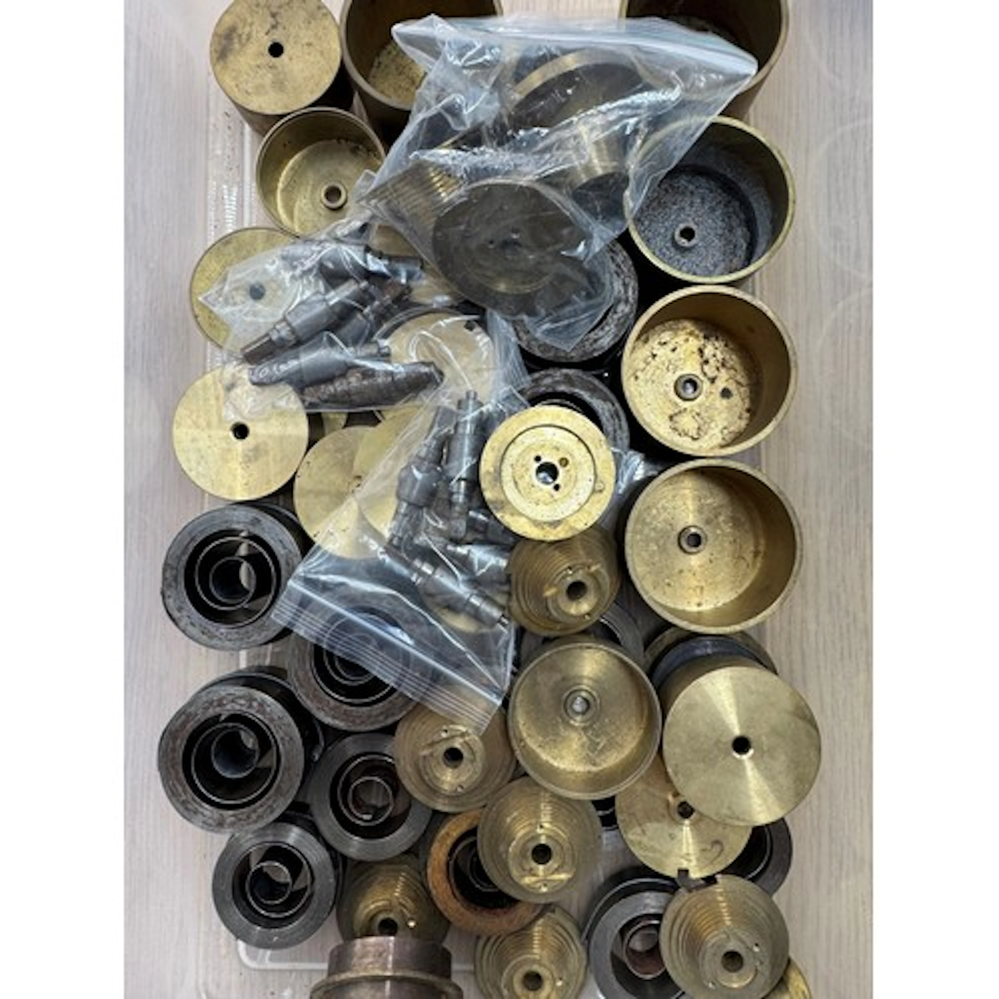 Assorted mainsprings, barrels and fusee cones...