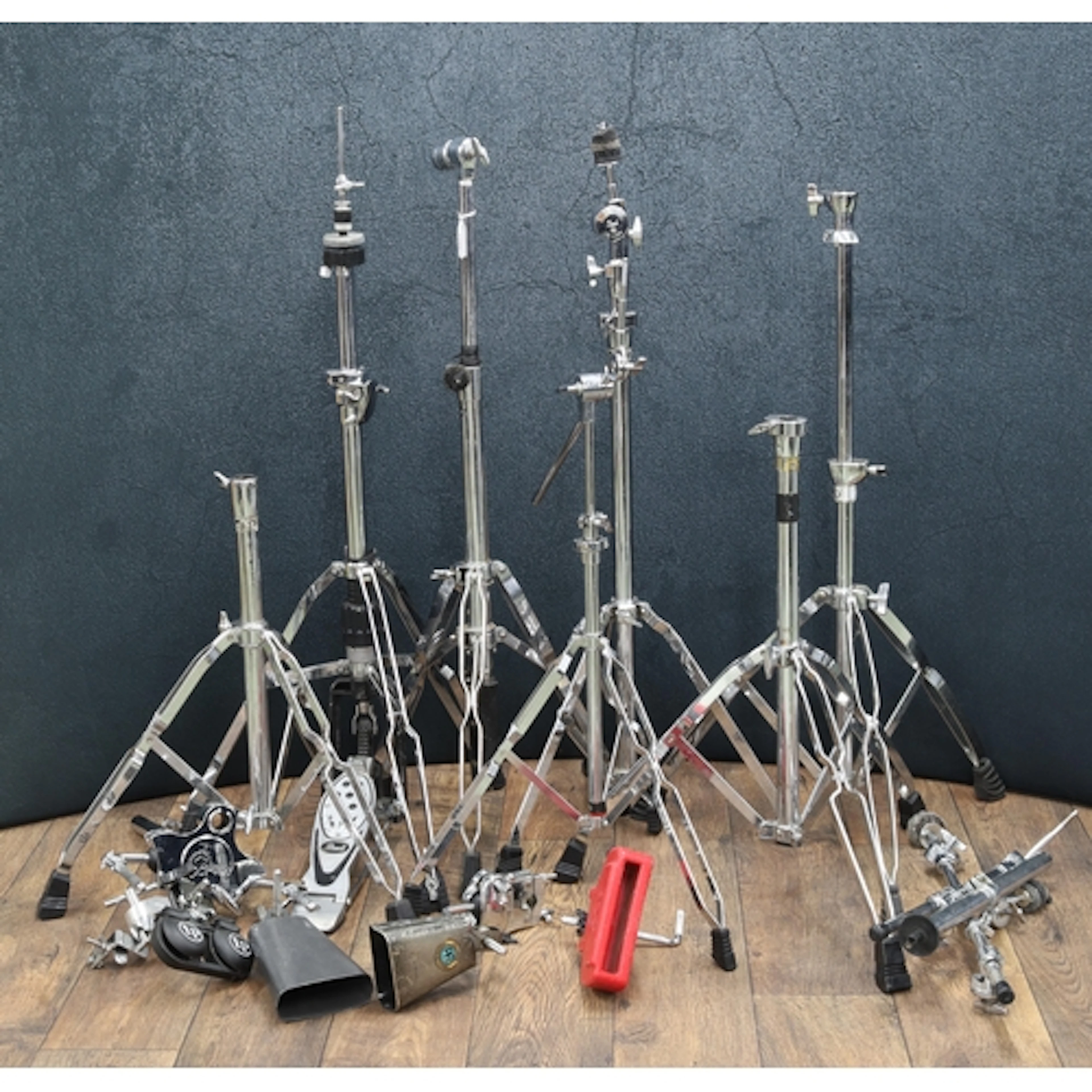 Group of assorted drum kit hardware and cymbal stands; also ...
