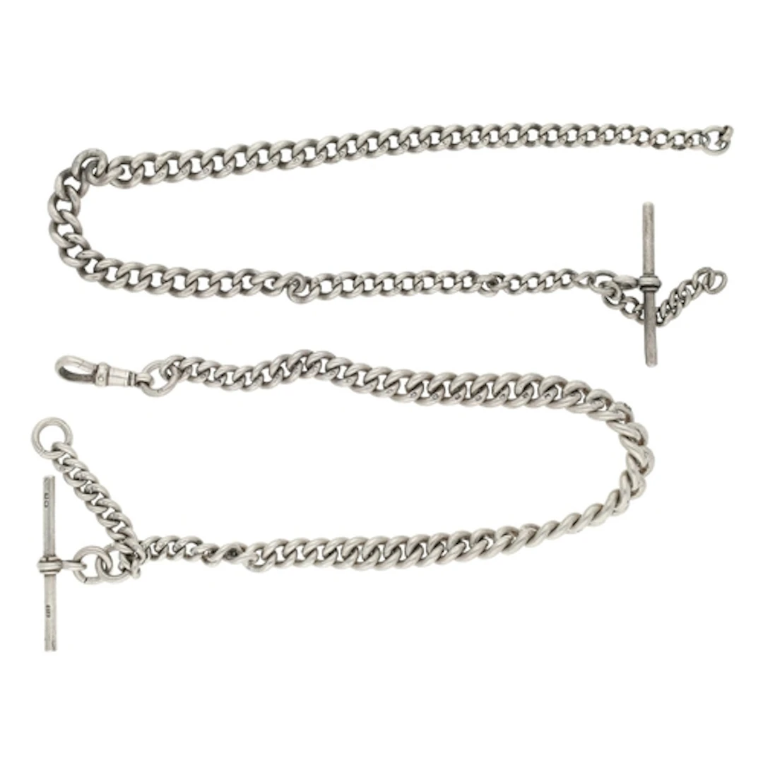 Two silver graduated curb link watch Albert chains, both wit...
