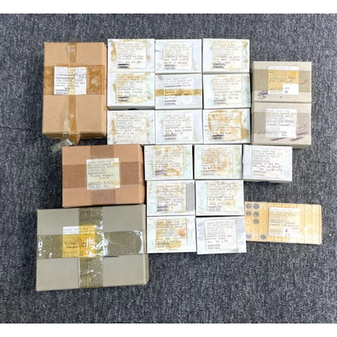 Box containing a quantity of Nardin HS2 527-3636 22"' chrono...