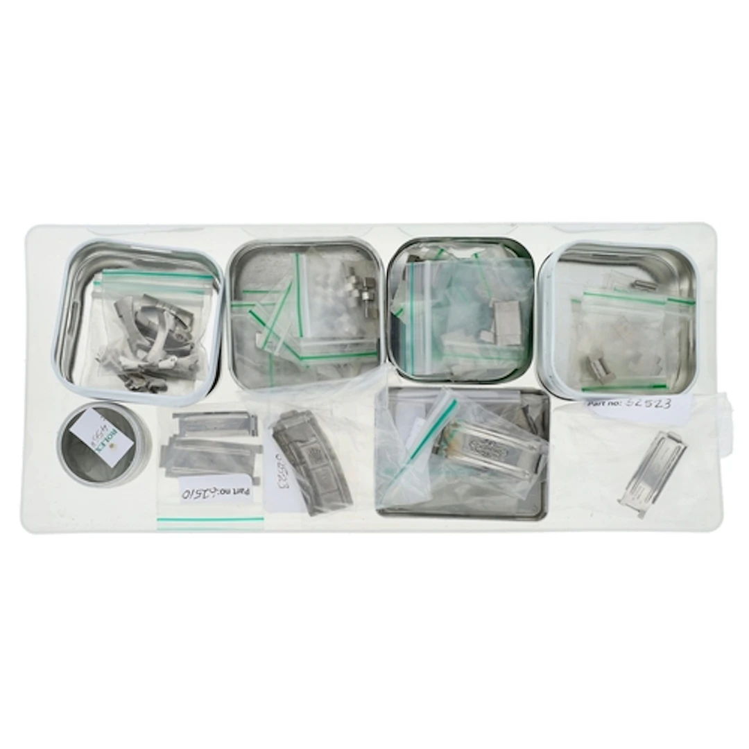 Quantity of wristwatch bracelet links, end links and clasp p...