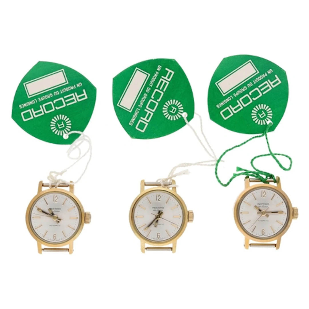 Three Record De Luxe automatic gold plated and stainless ste...