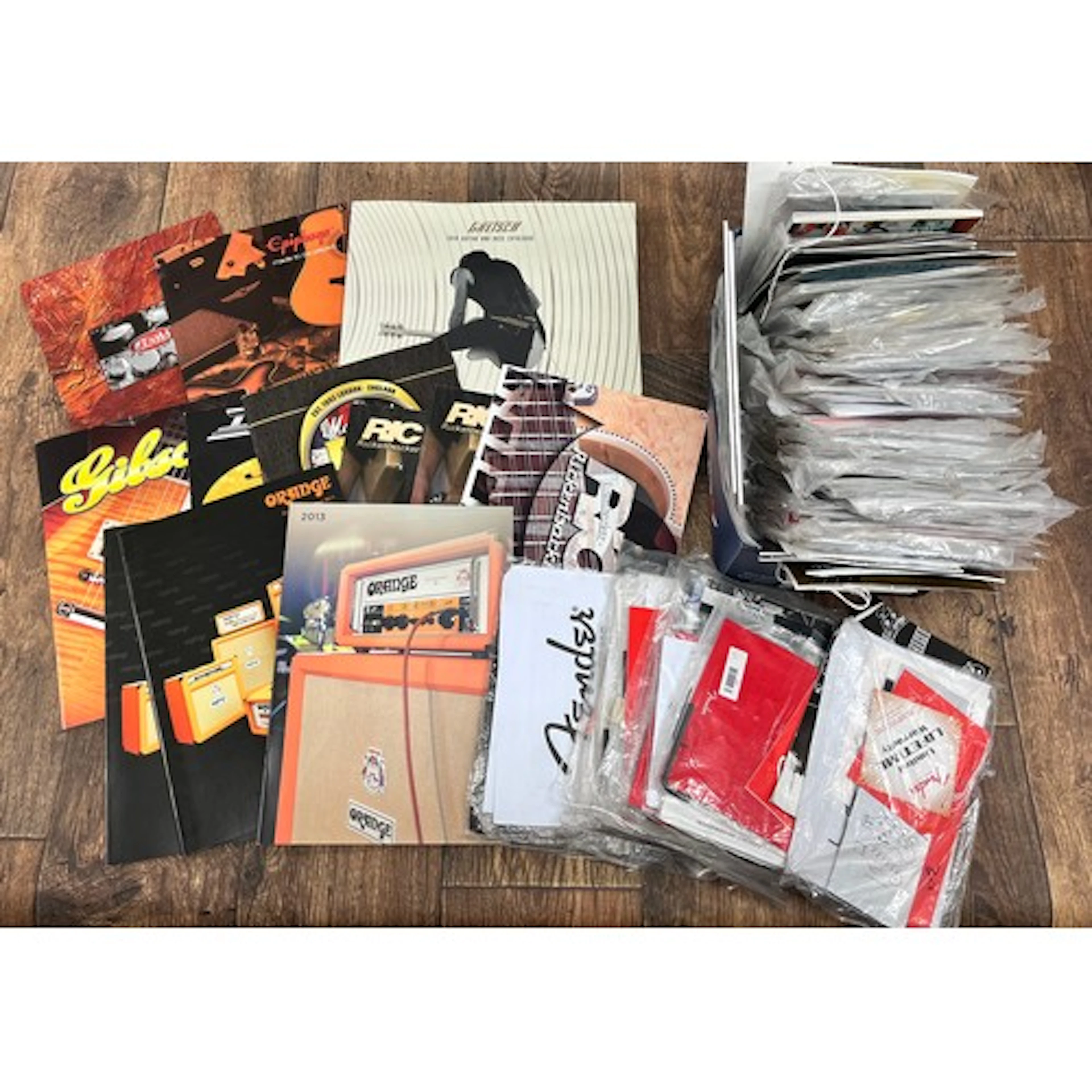 Small selection of miscellaneous and guitar bass catalogues,...