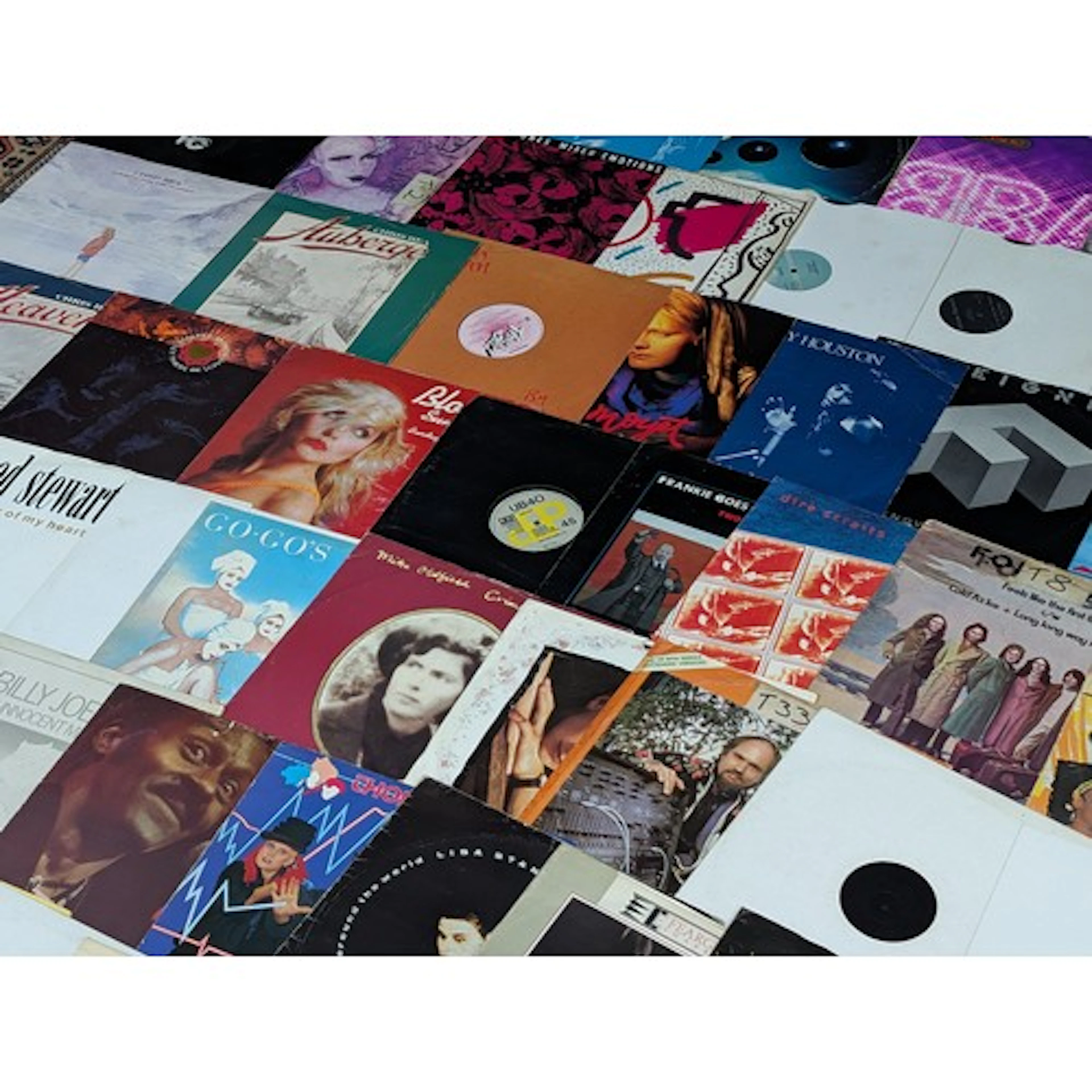 Approximately seventy rock/pop and miscellaneous 12" singles...