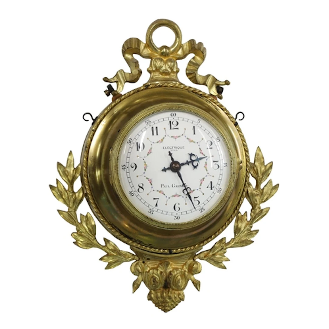 Paul Garnier, Paris Electrique cartel gilt metal wall clock,...