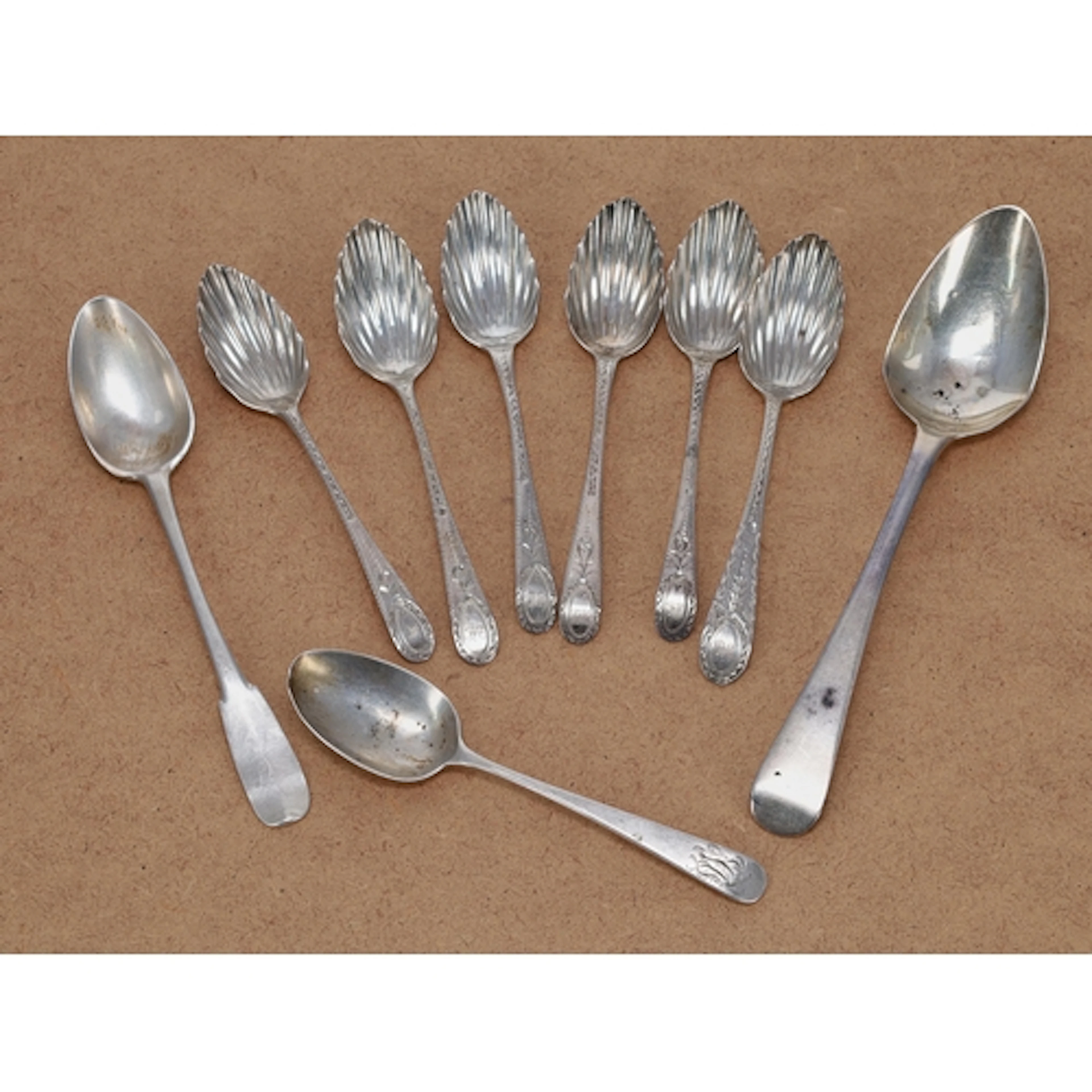 Matched set of six ornate George III silver tea spoons, with...
