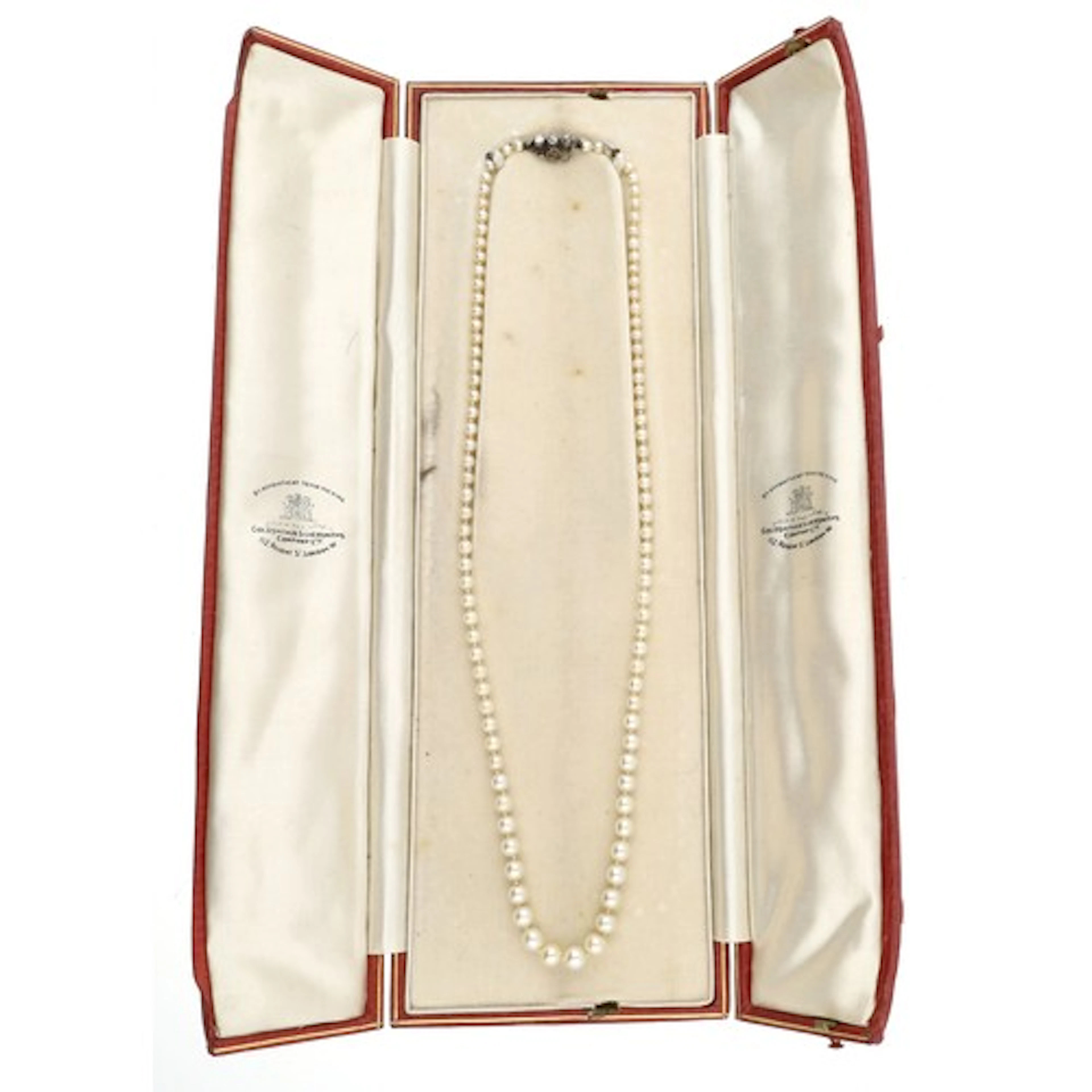 Attractive graduated cultured pearl necklace with a diamond ...