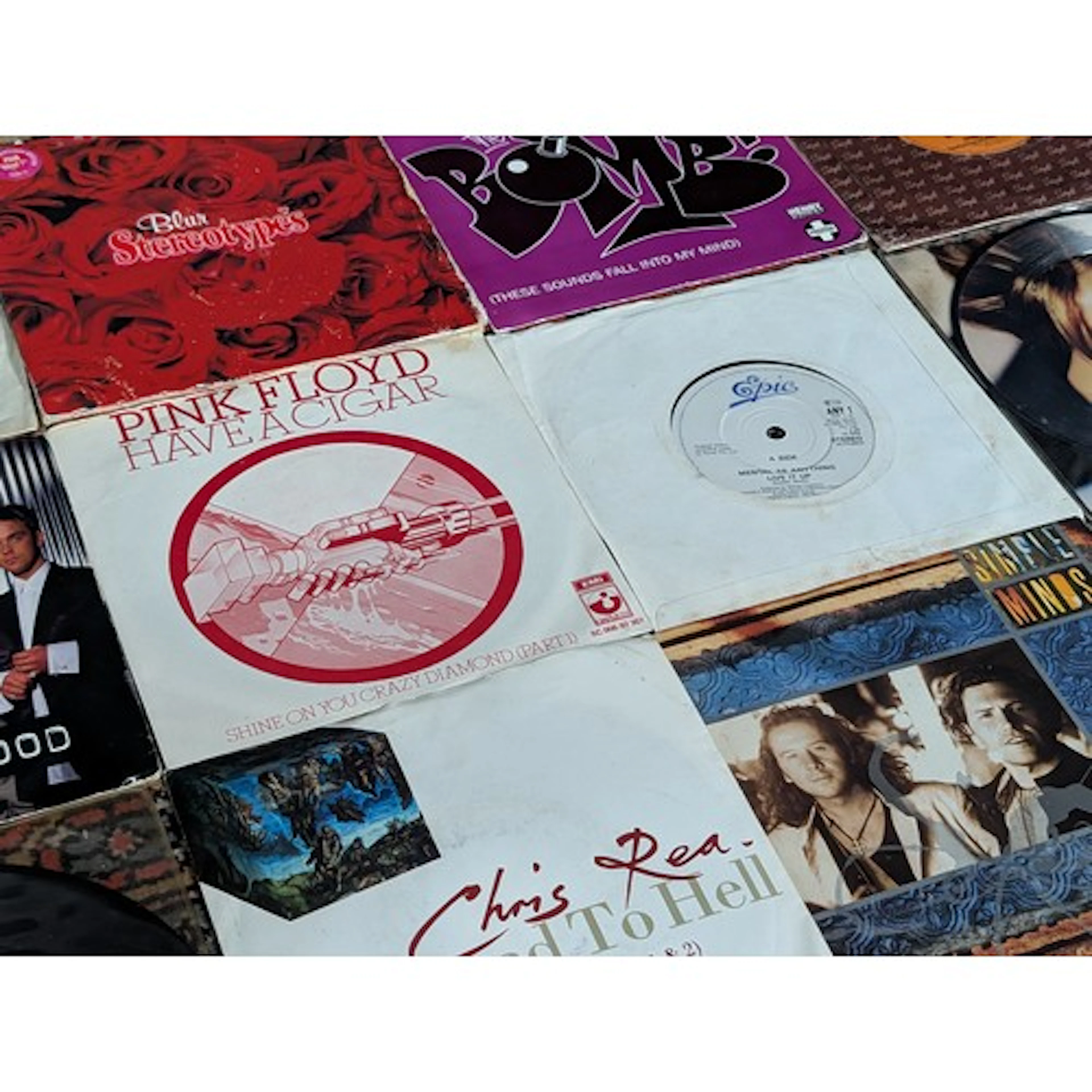 Approximately fifteen 45rpm 7" rock/pop and miscellaneous si...