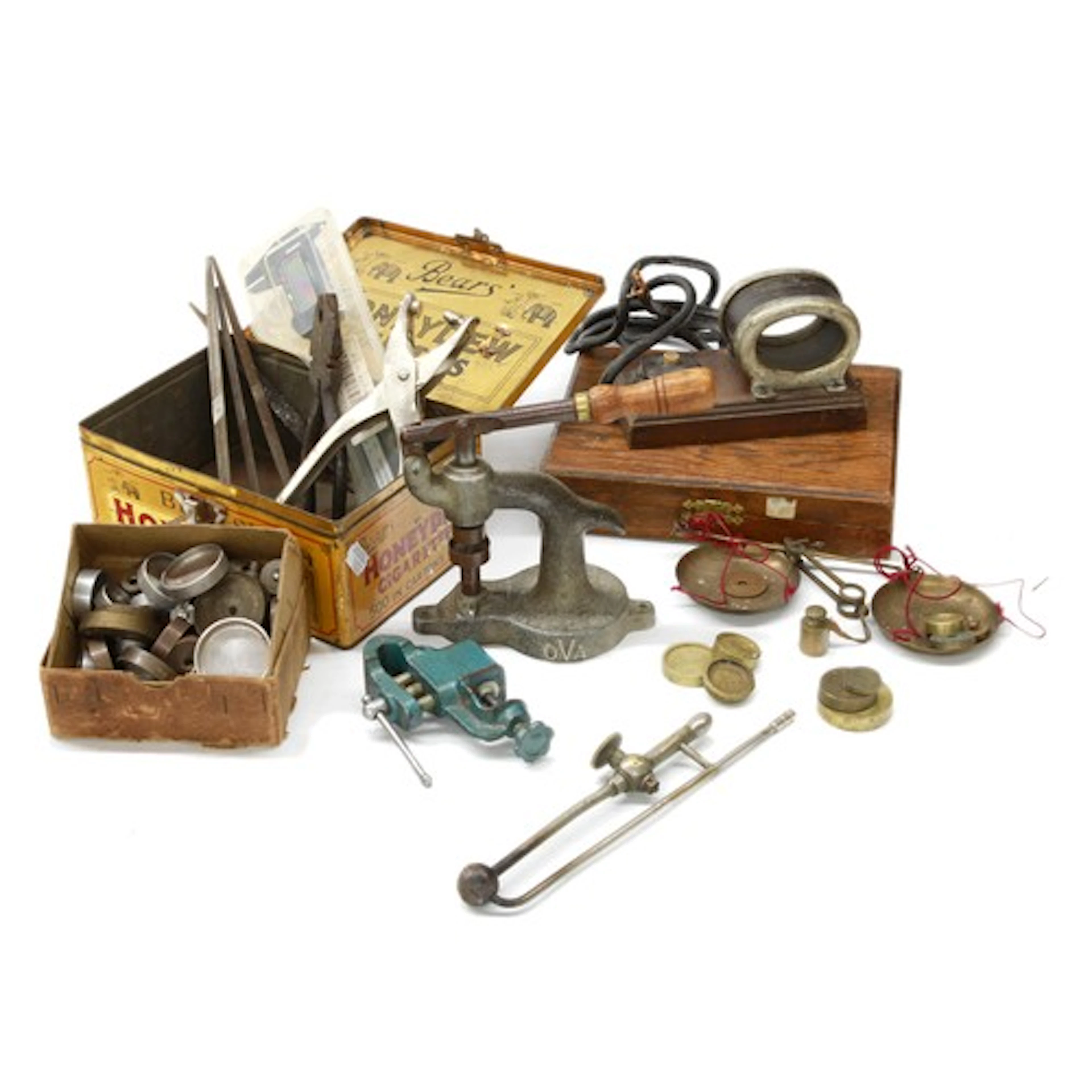 OVA watchmakers press, with an assortment of dies; together ...
