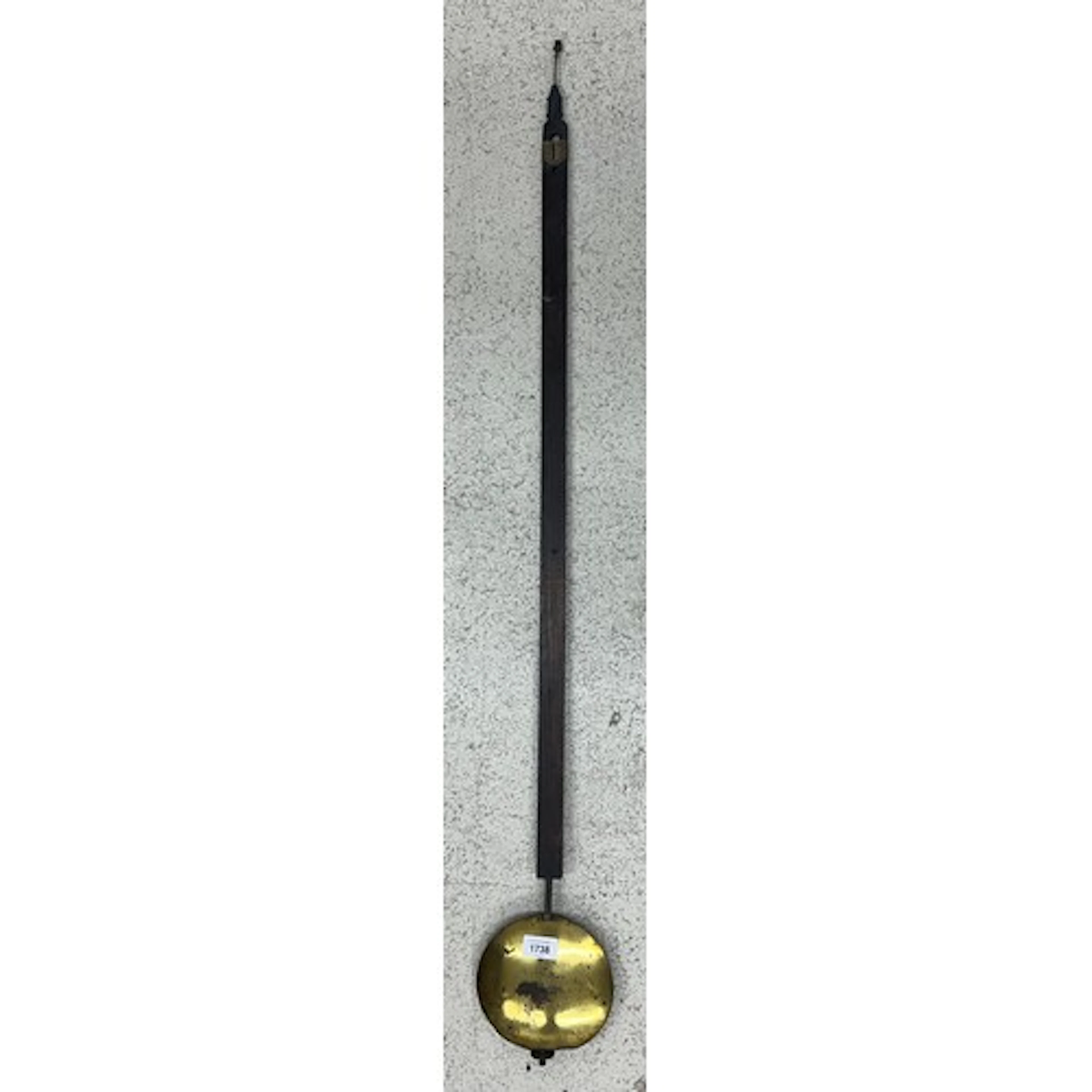 Turret clock pendulum with a brass bob