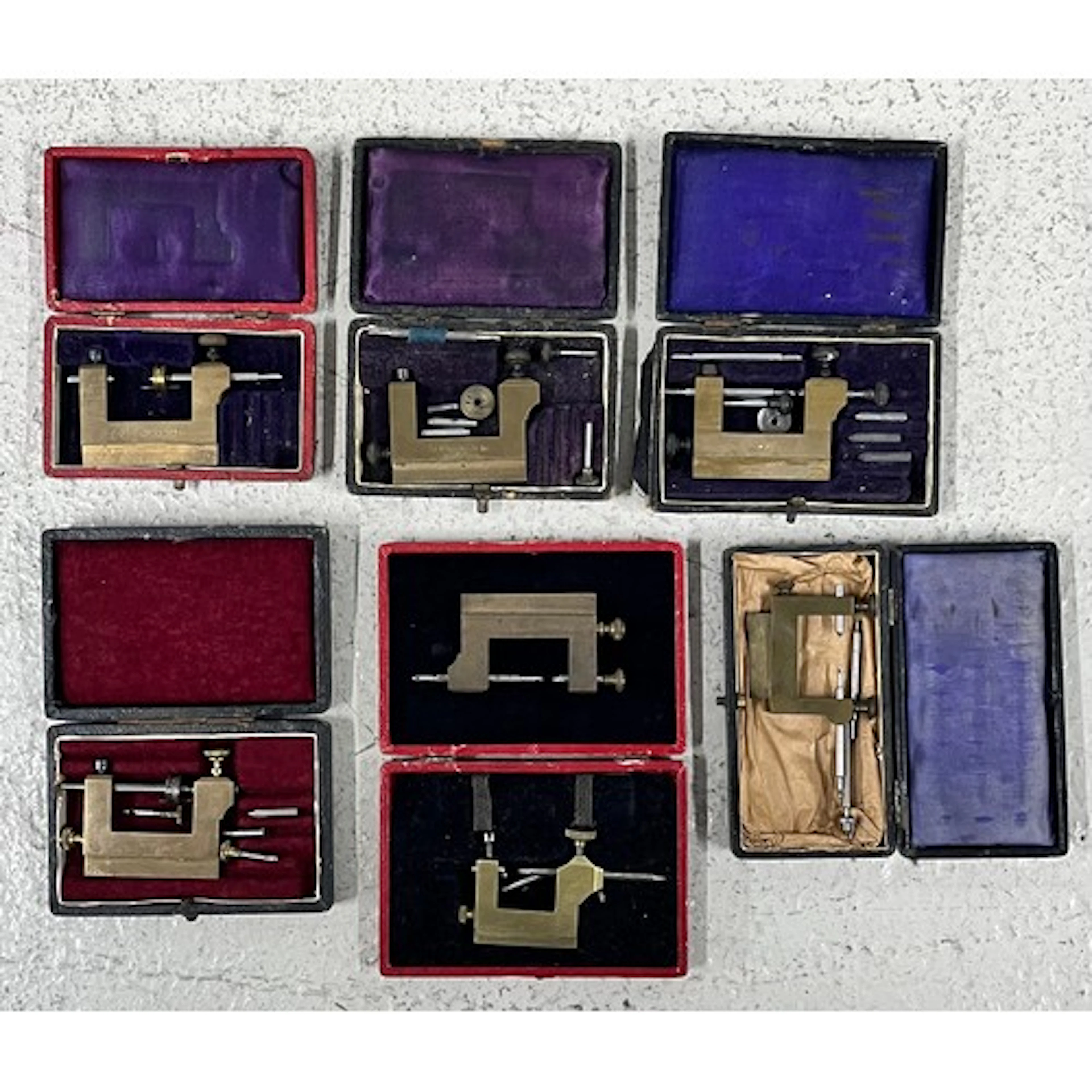 Seven small brass and steel watchmakers pivot tools...