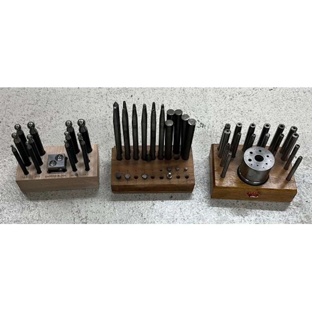 Pearl staking set; together with a dapping block and punches...