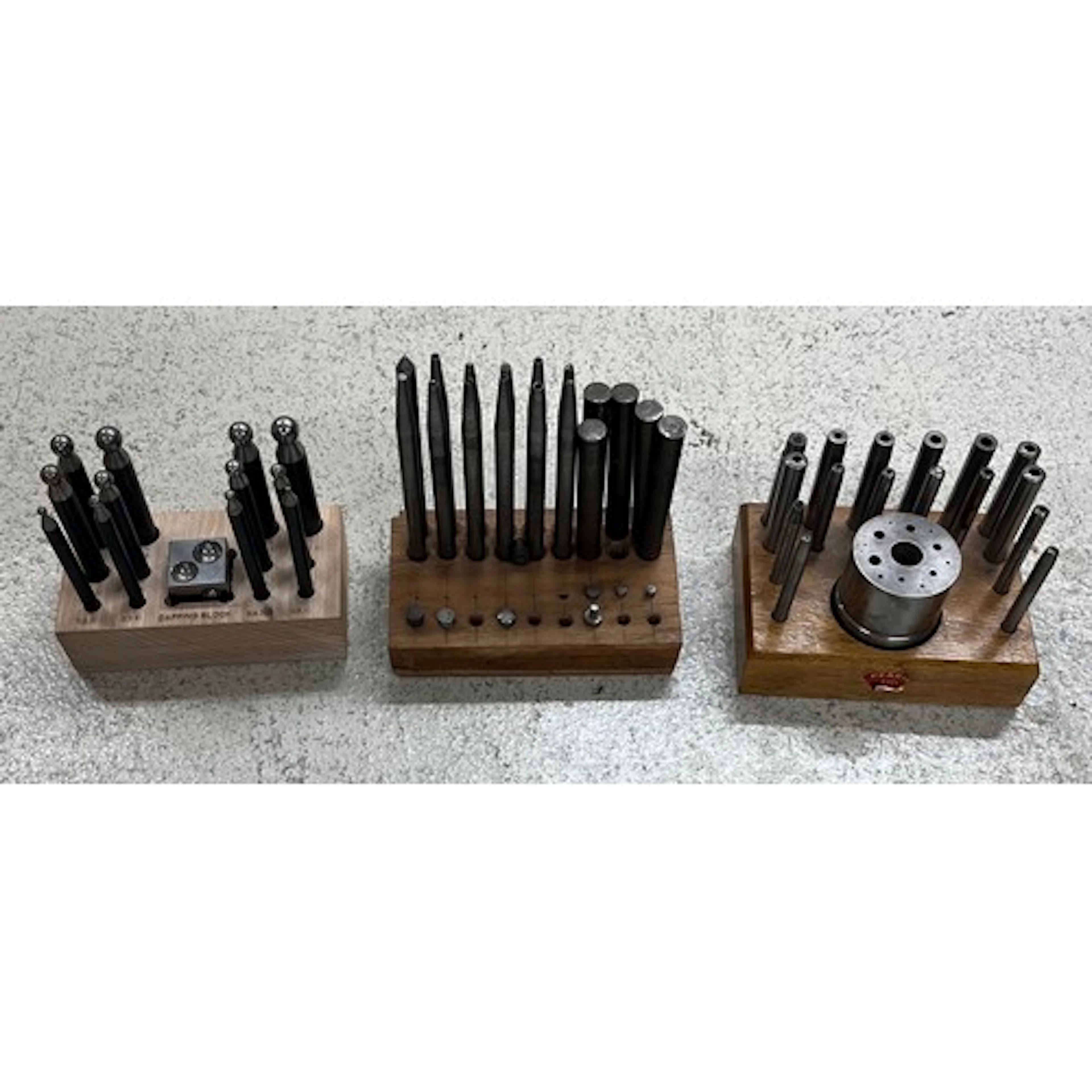 Pearl staking set; together with a dapping block and punches...
