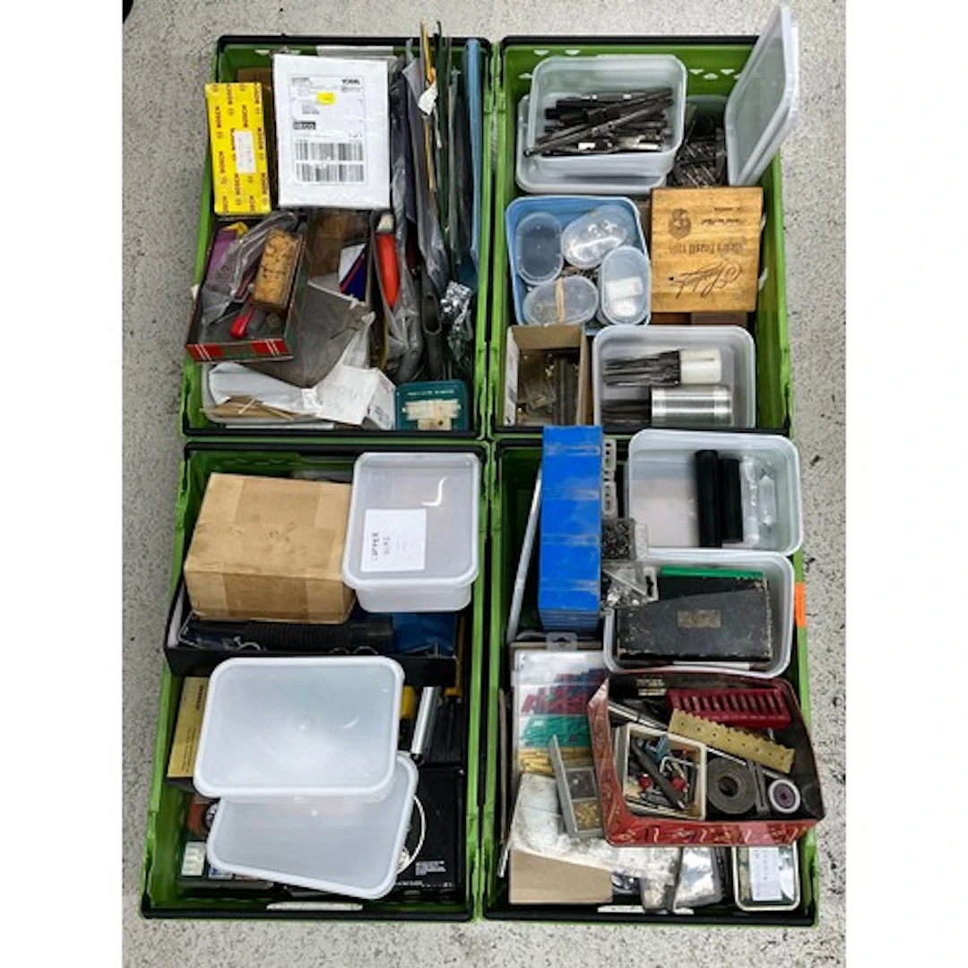 Four crates containing a quantity of assorted tools and hard...