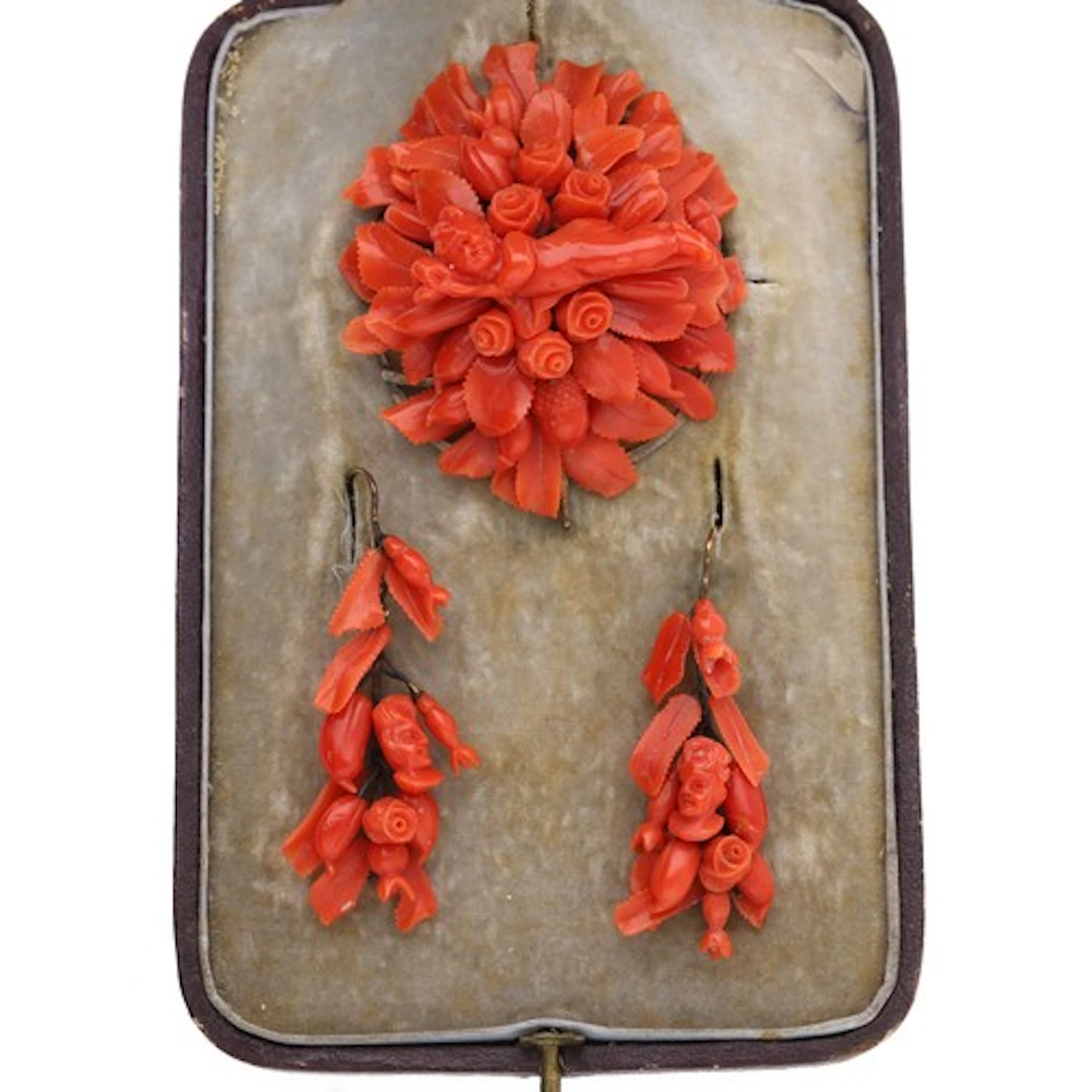 Victorian carved pink coral floral and cherub design jewelle...