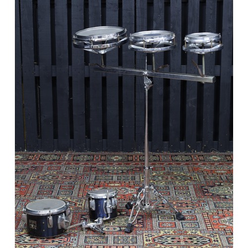 Set of 3 Remo Rototom drums; 6", 8", and 10", on a stand and...