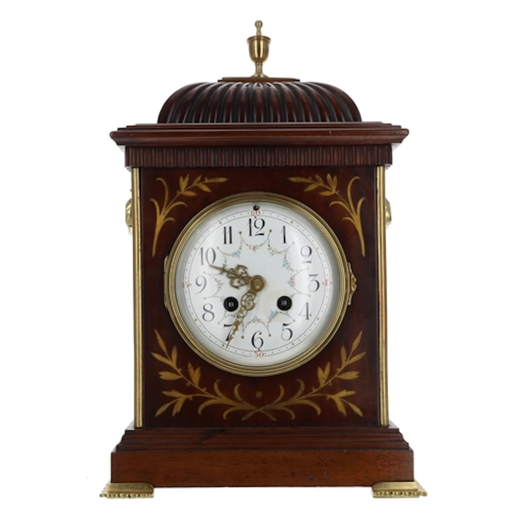 Attractive French mahogany and brass inlaid two train bracke...