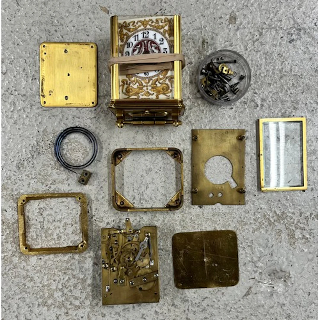 French brass and porcelain panelled carriage clock in need o...