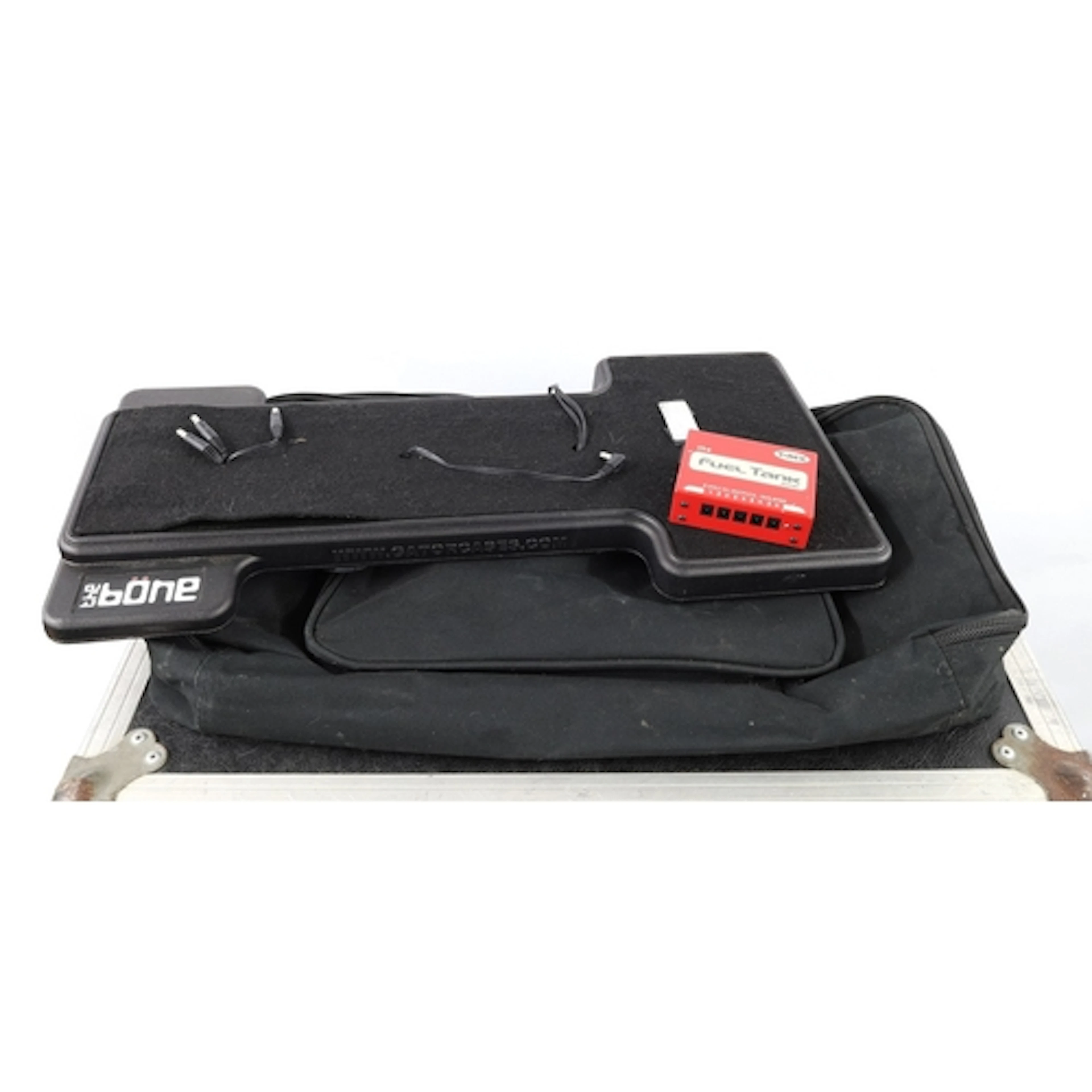 The Bone by Gator guitar pedal board with bag; together with...