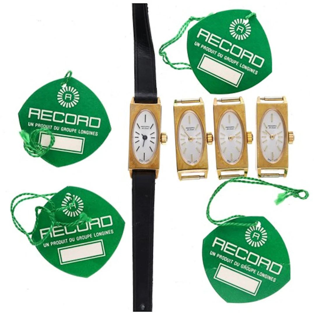 Four Record De Luxe rectangular gold plated and stainless st...