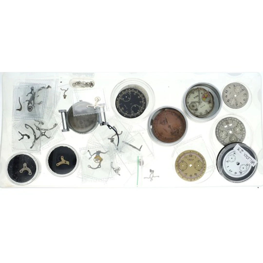 Quantity of chronograph wristwatch parts to include Chronogr...
