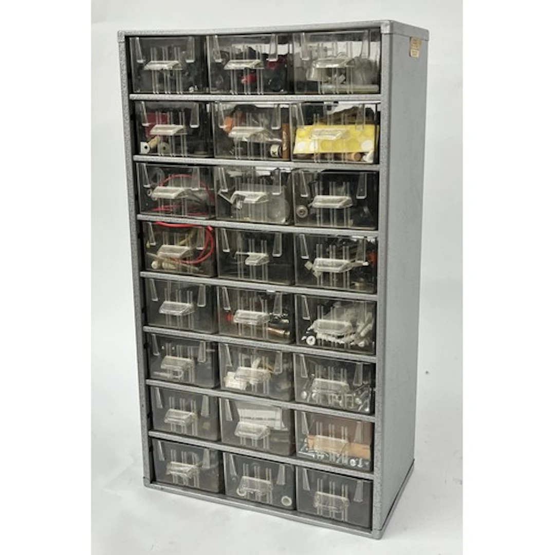 Metal storage rack comprising twenty-four individual drawers...