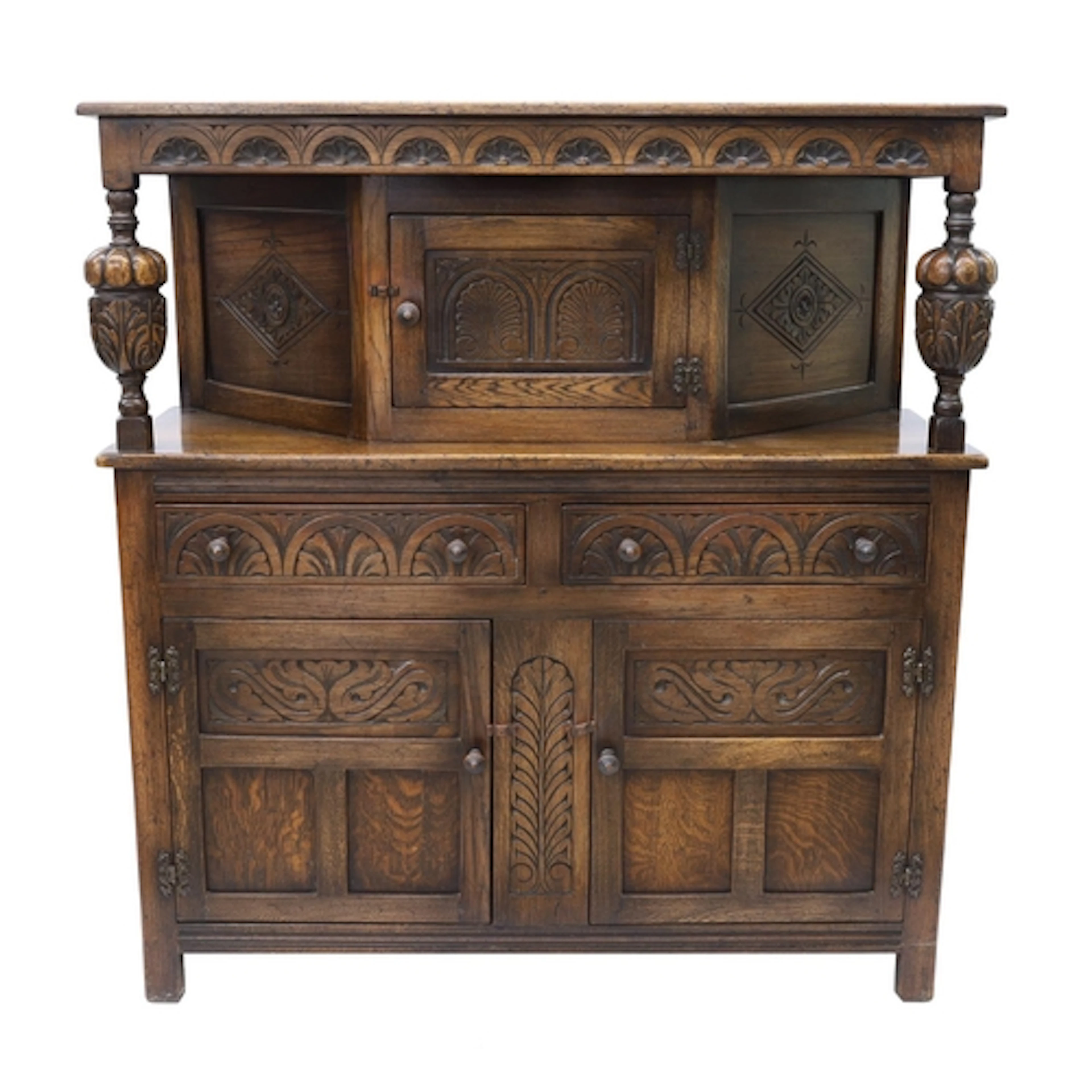 17th century style carved oak court cupboard, with bulbous s...