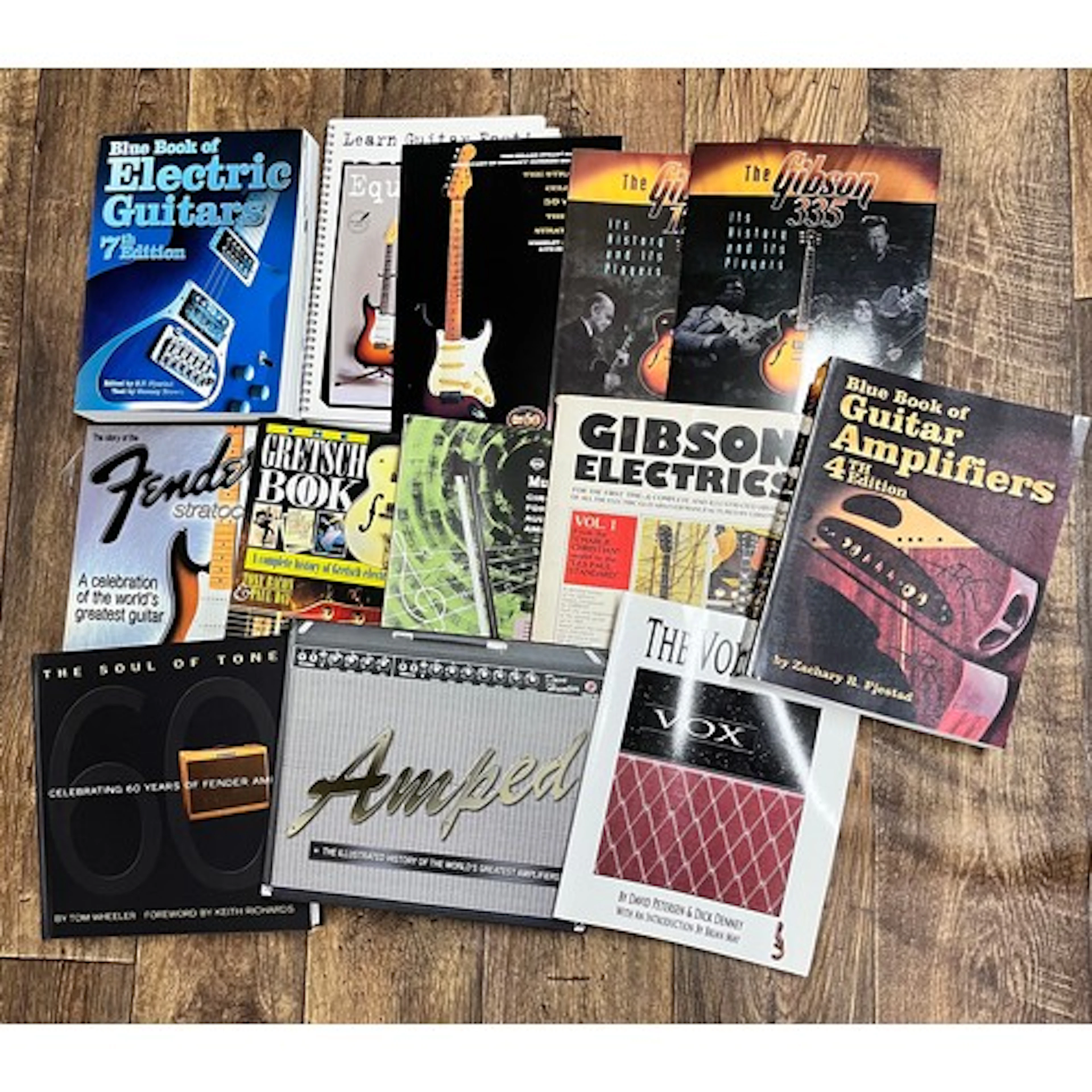 Selection of guitar reference books to include Gibson Electr...