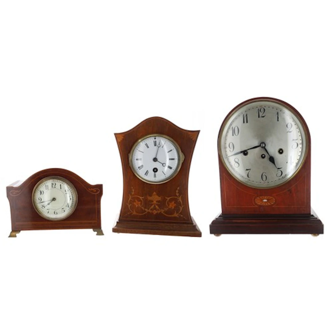 Mahogany arch top three train chiming inlaid mantel clock, 7...