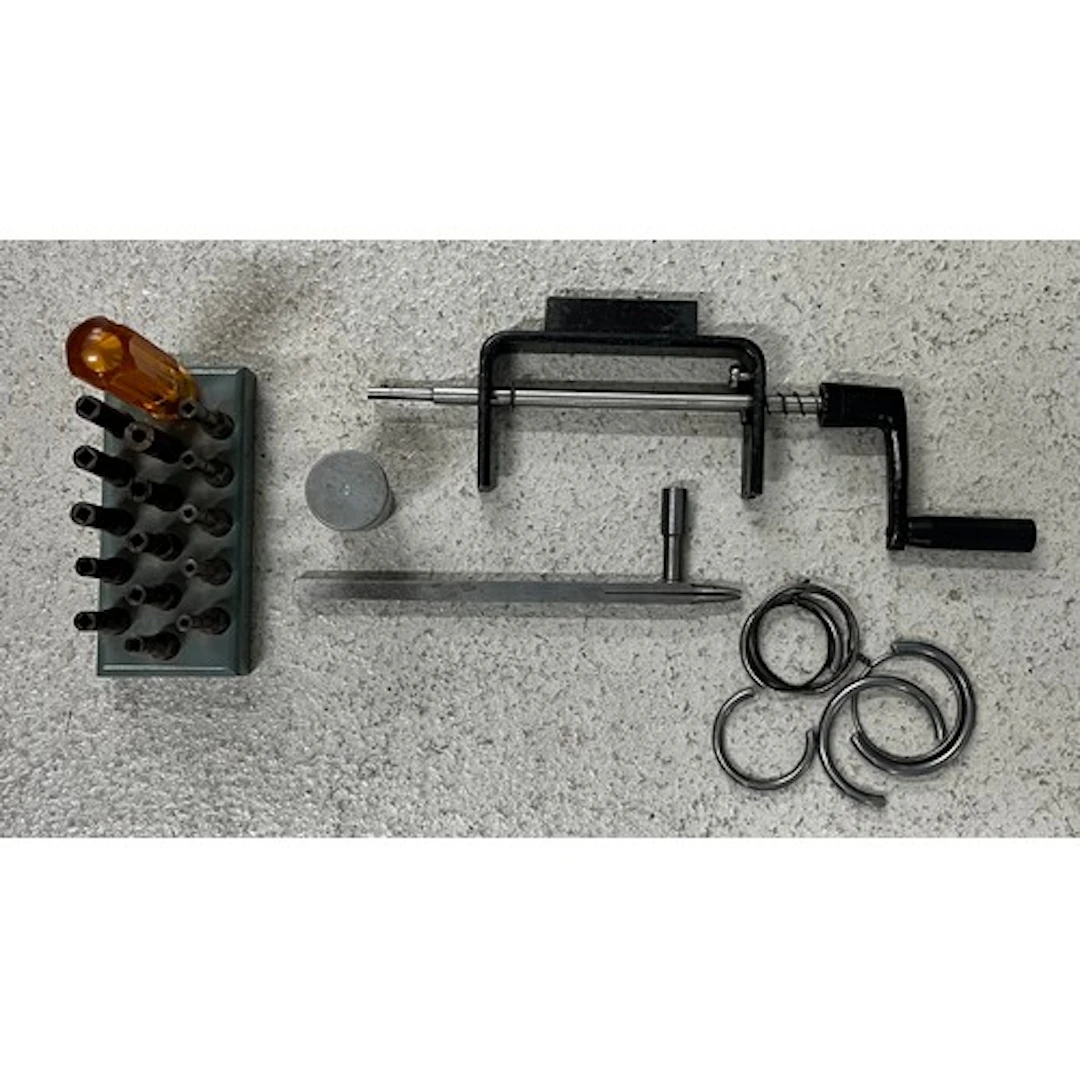 Clock mainspring let-down tool and unwinding keys; with a qu...