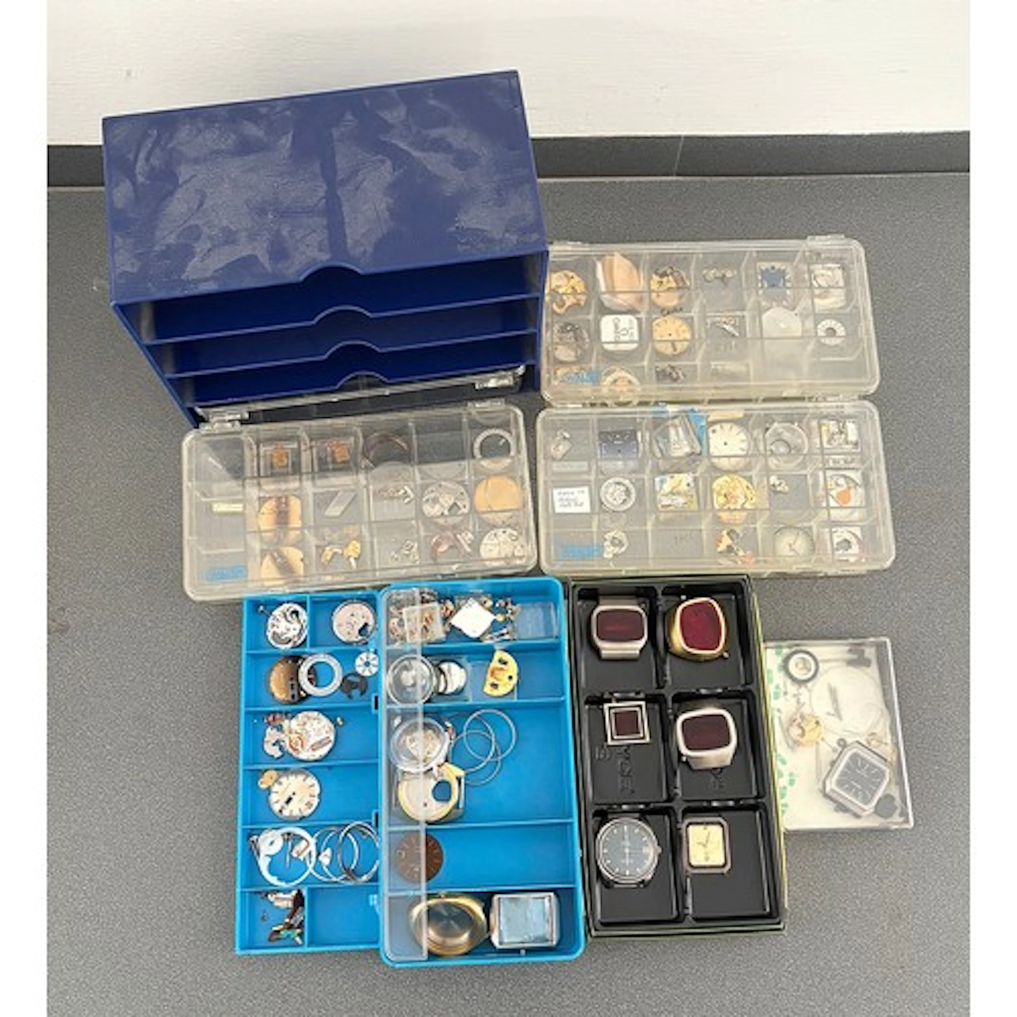 Quantity of quartz/electronic wristwatch spares and parts to...