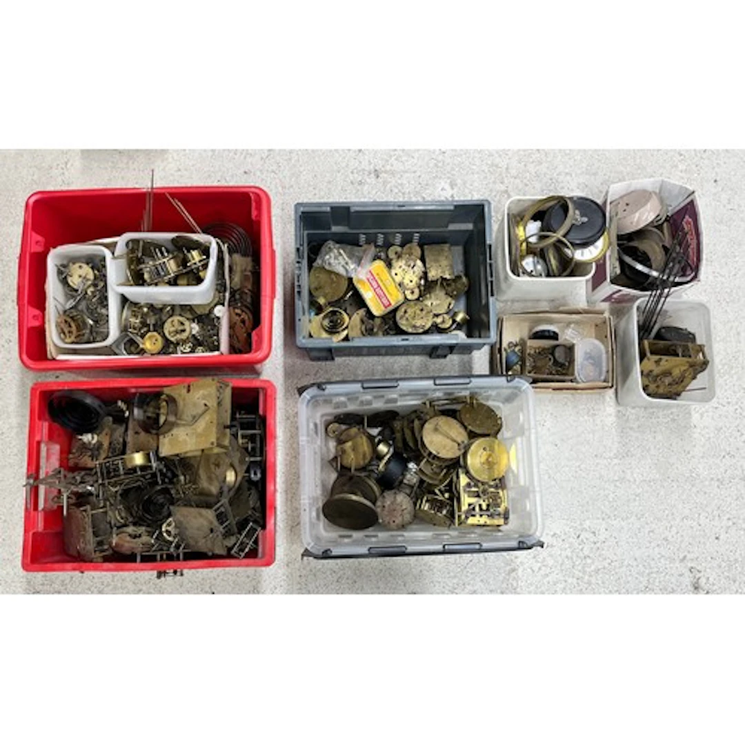 Large quantity of assorted clock movements for repair and sp...