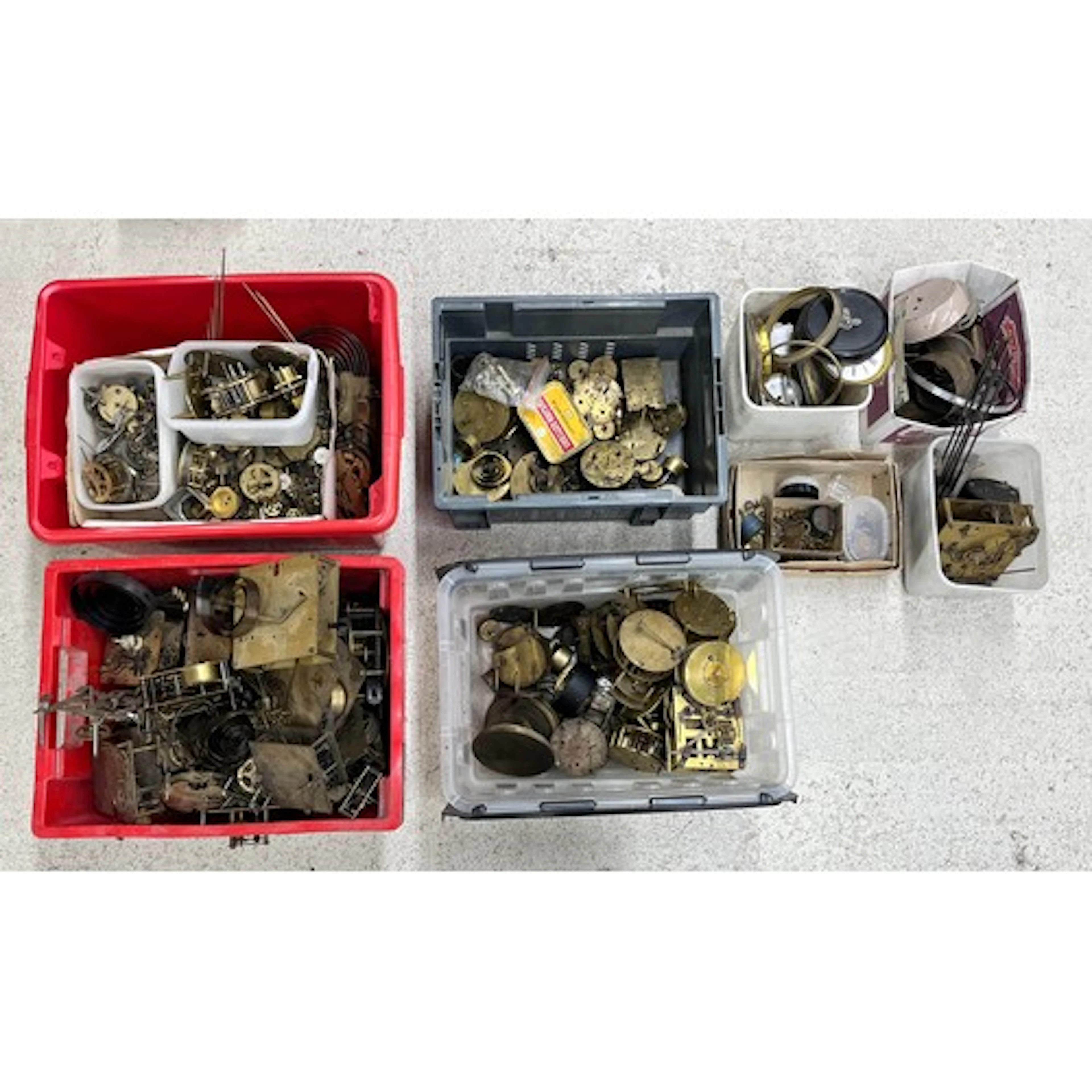 Large quantity of assorted clock movements for repair and sp...