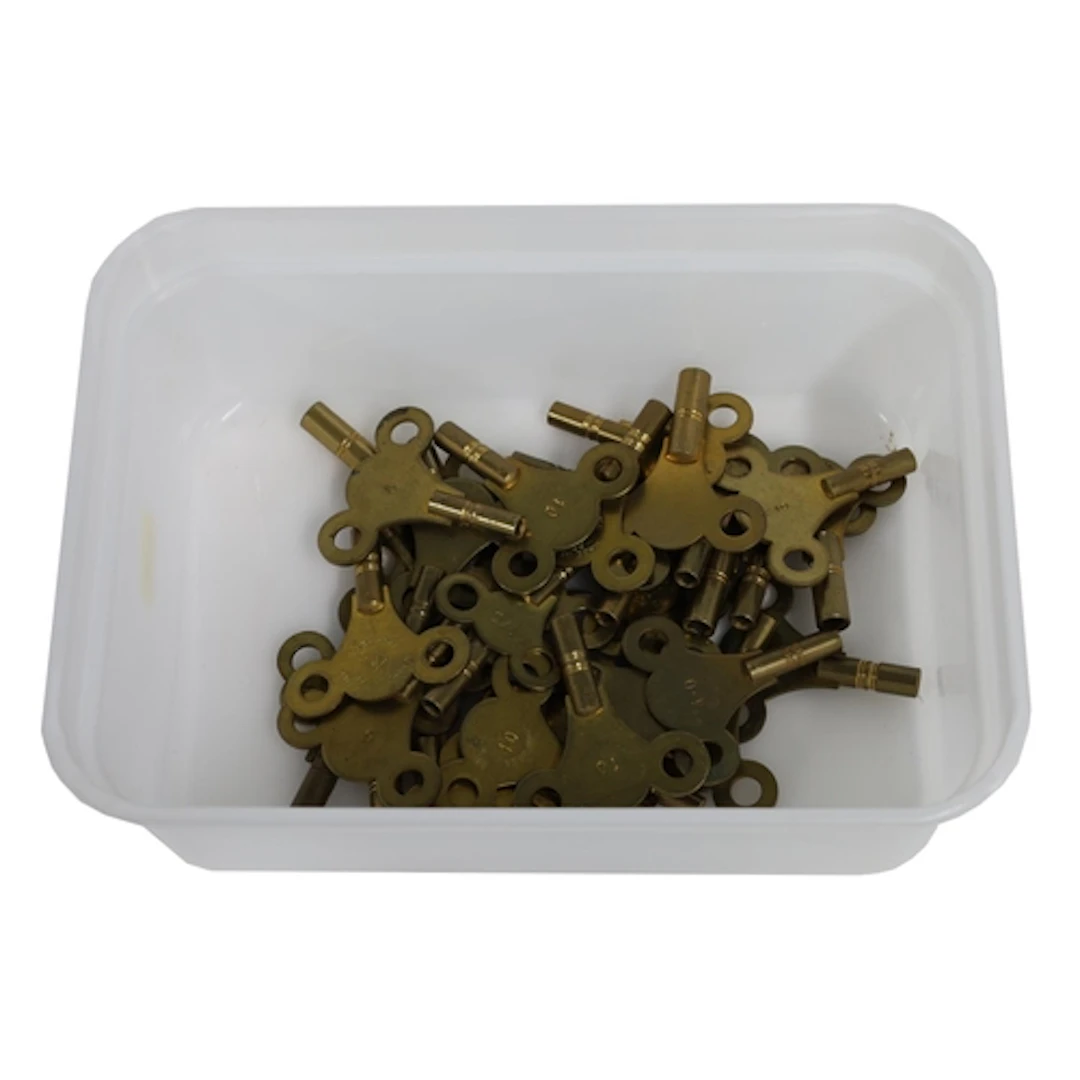 Quantity of brass clock winding keys
