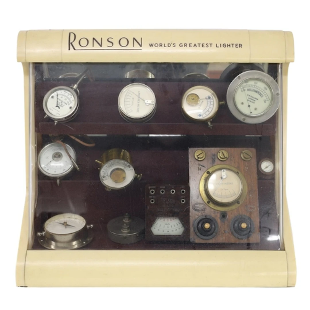 Collection of eleven vintage voltmeters in an ivory coloured...