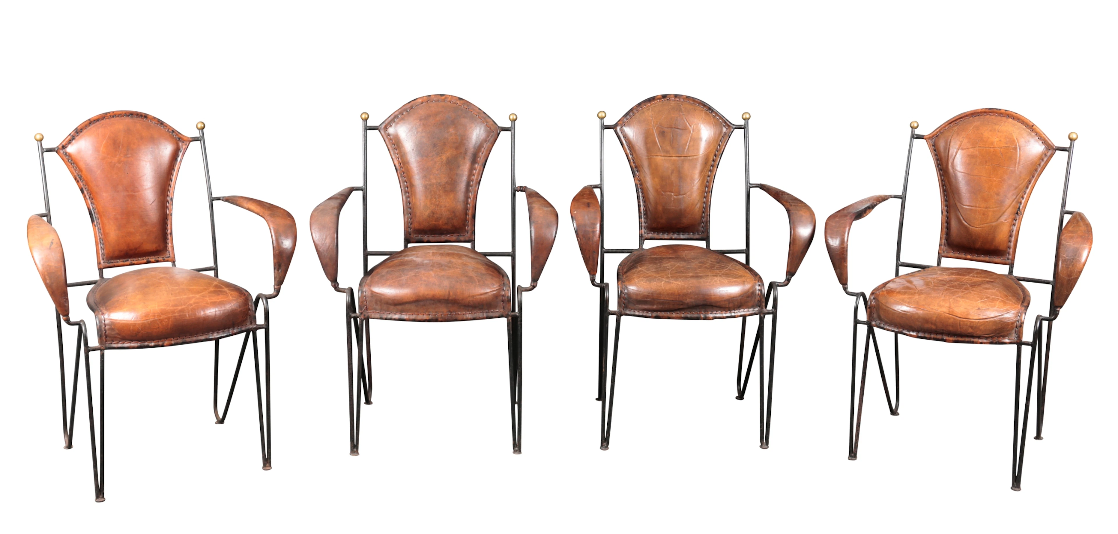 *JACQUES ADNET (1900-1984): A SET OF FOUR DINING CHAIRS