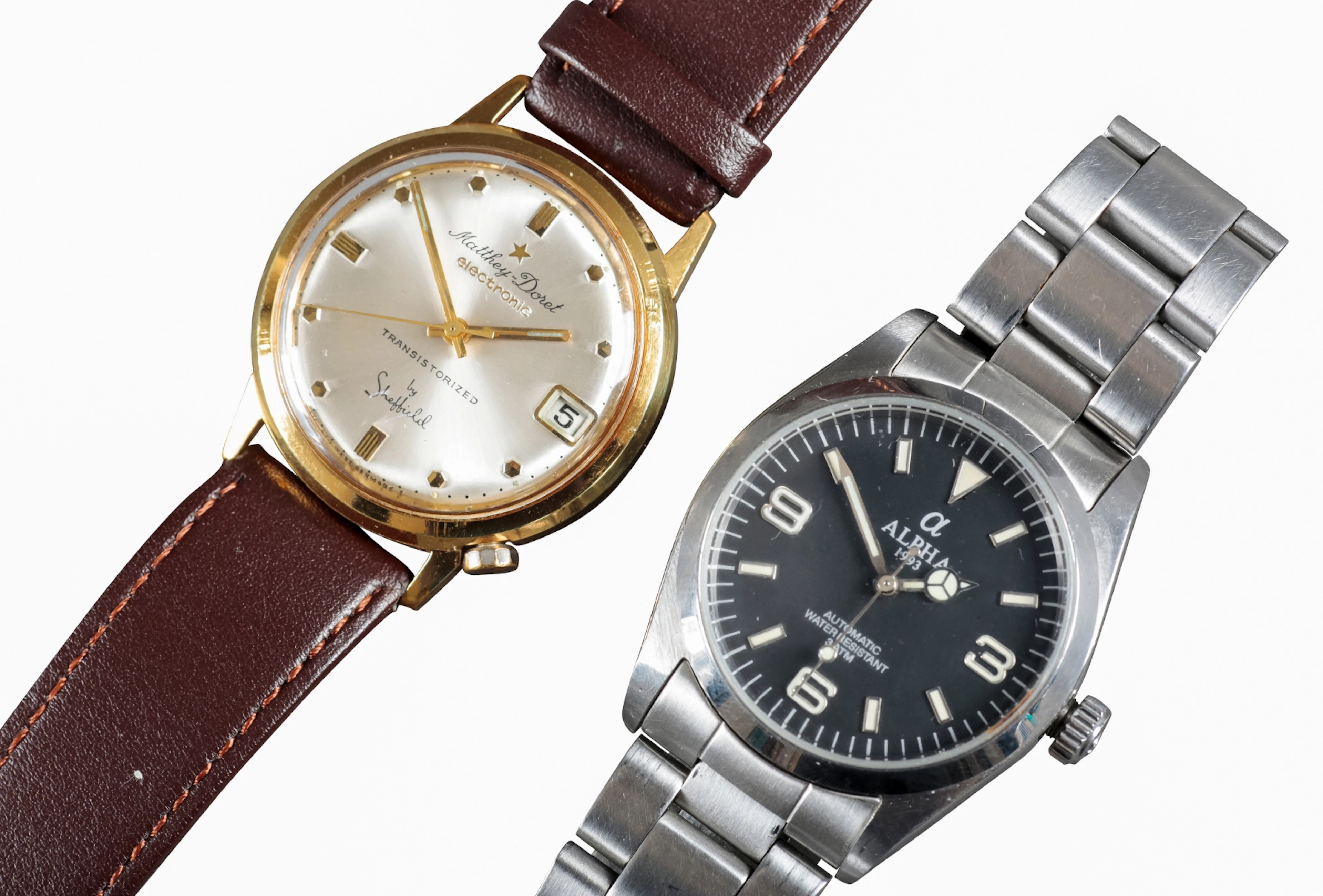 ALPHA: A STAINLESS STEEL BRACELET WATCH
