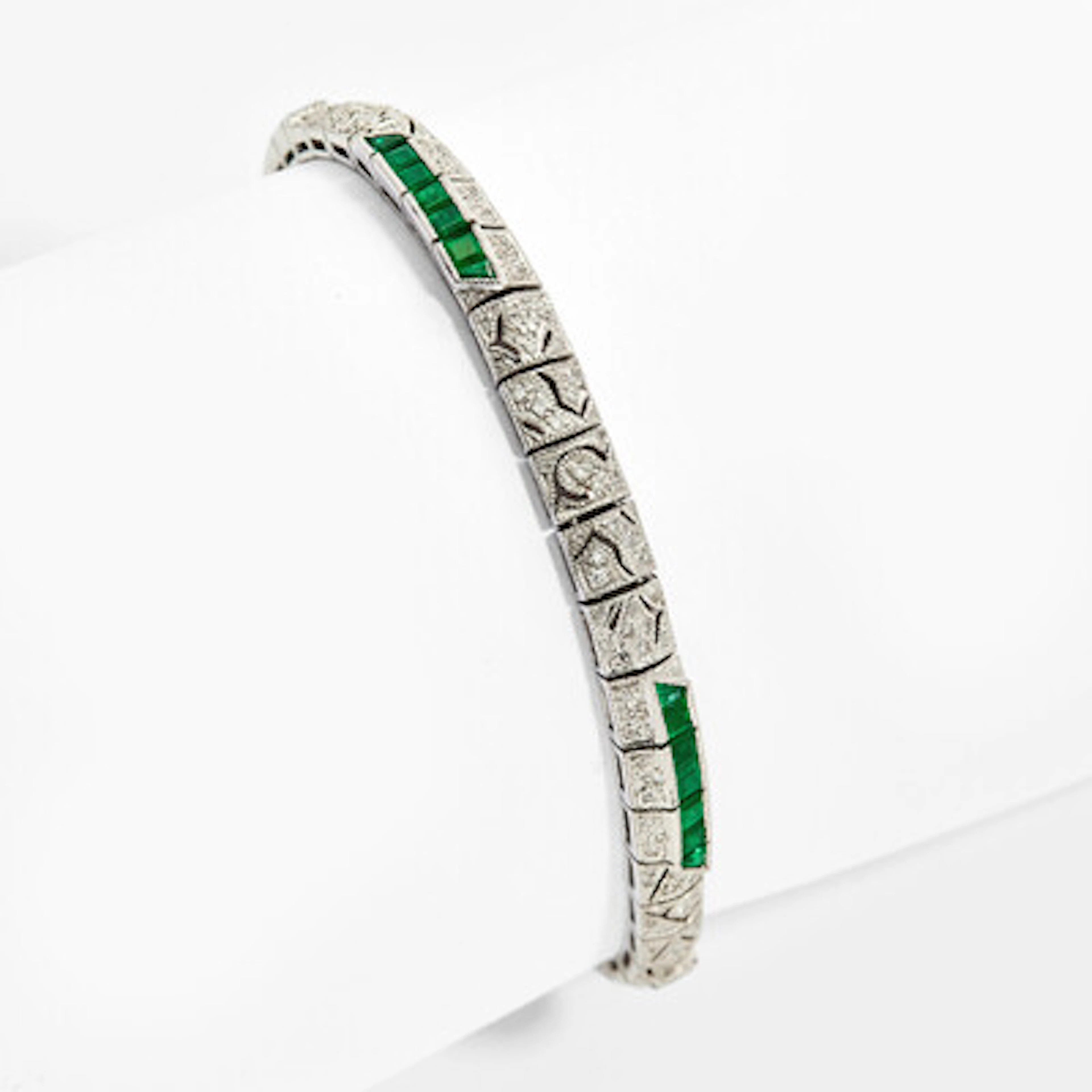 Armbånd med smaragder og diamanter