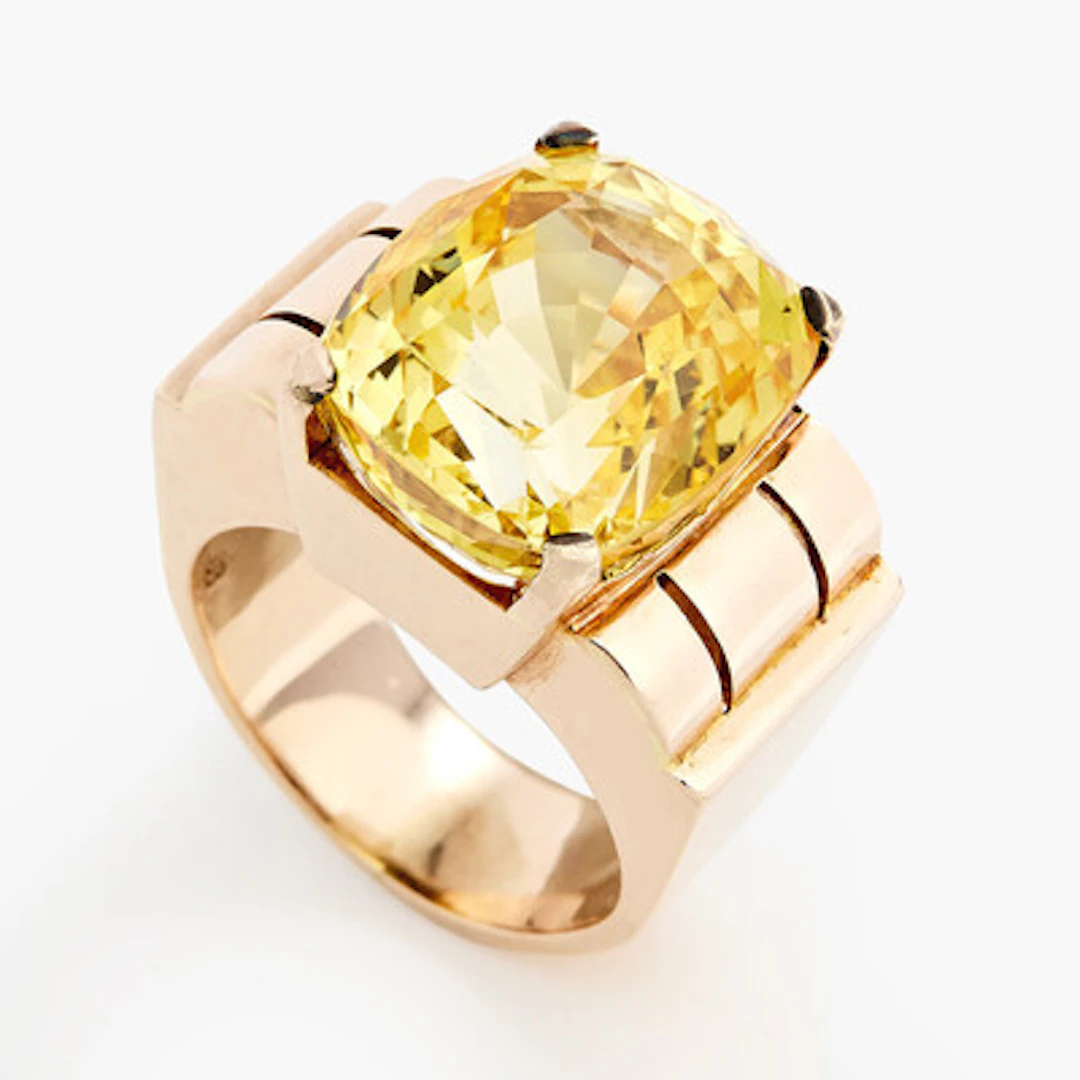Ring med en gul safir