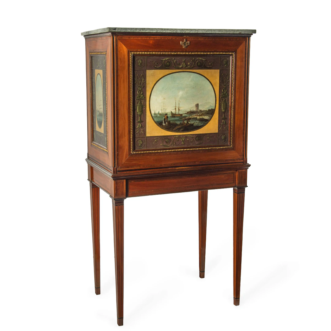 A unique late Georgian satinwood collector’s cabinet painted with