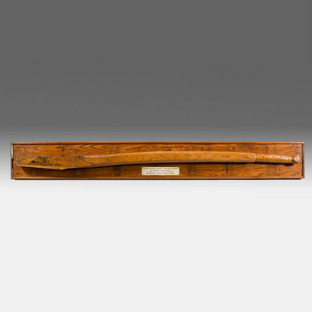 Oak yacht tiller mounted on two deck planks