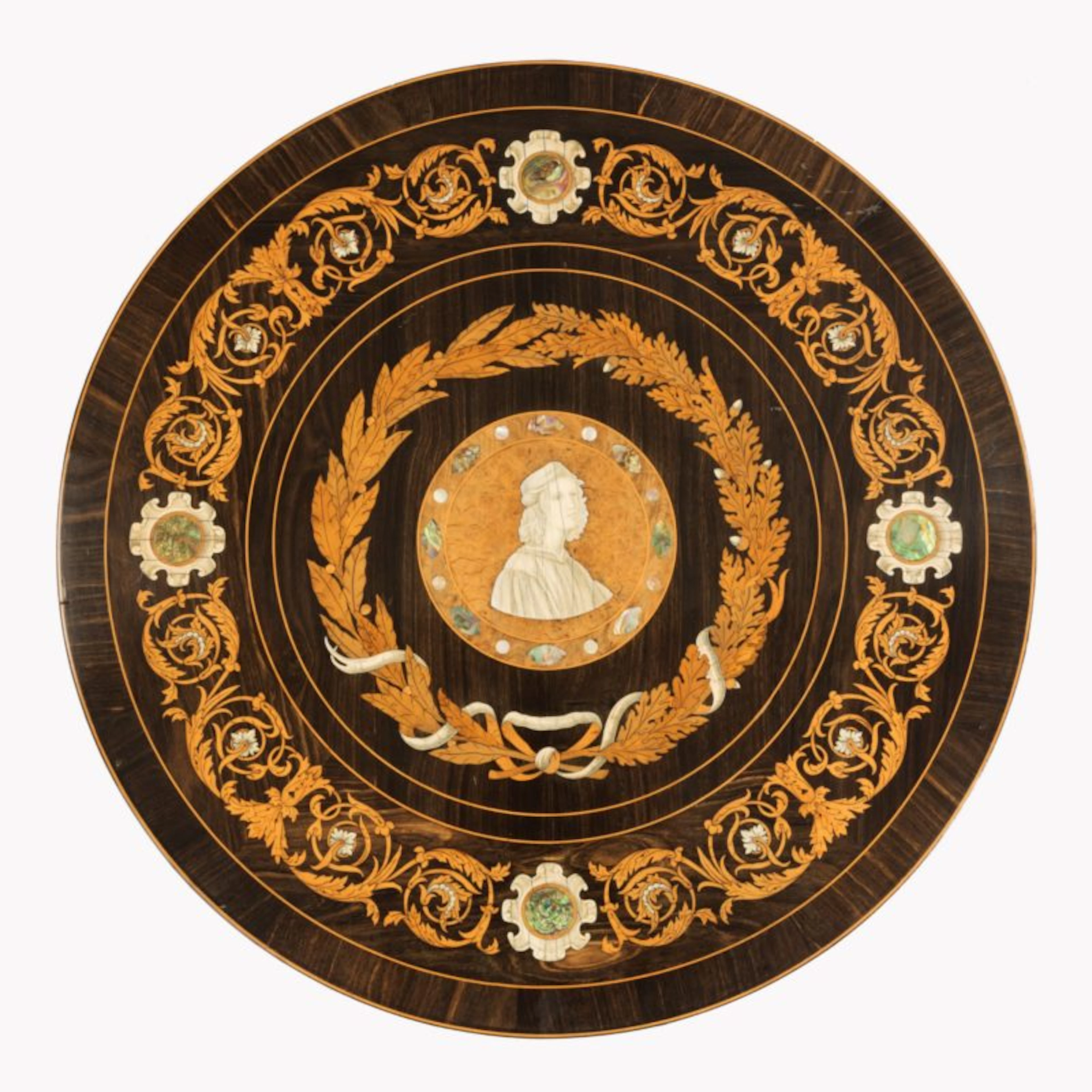 A decorative intarsia roundel in the Renaissance style, attributed