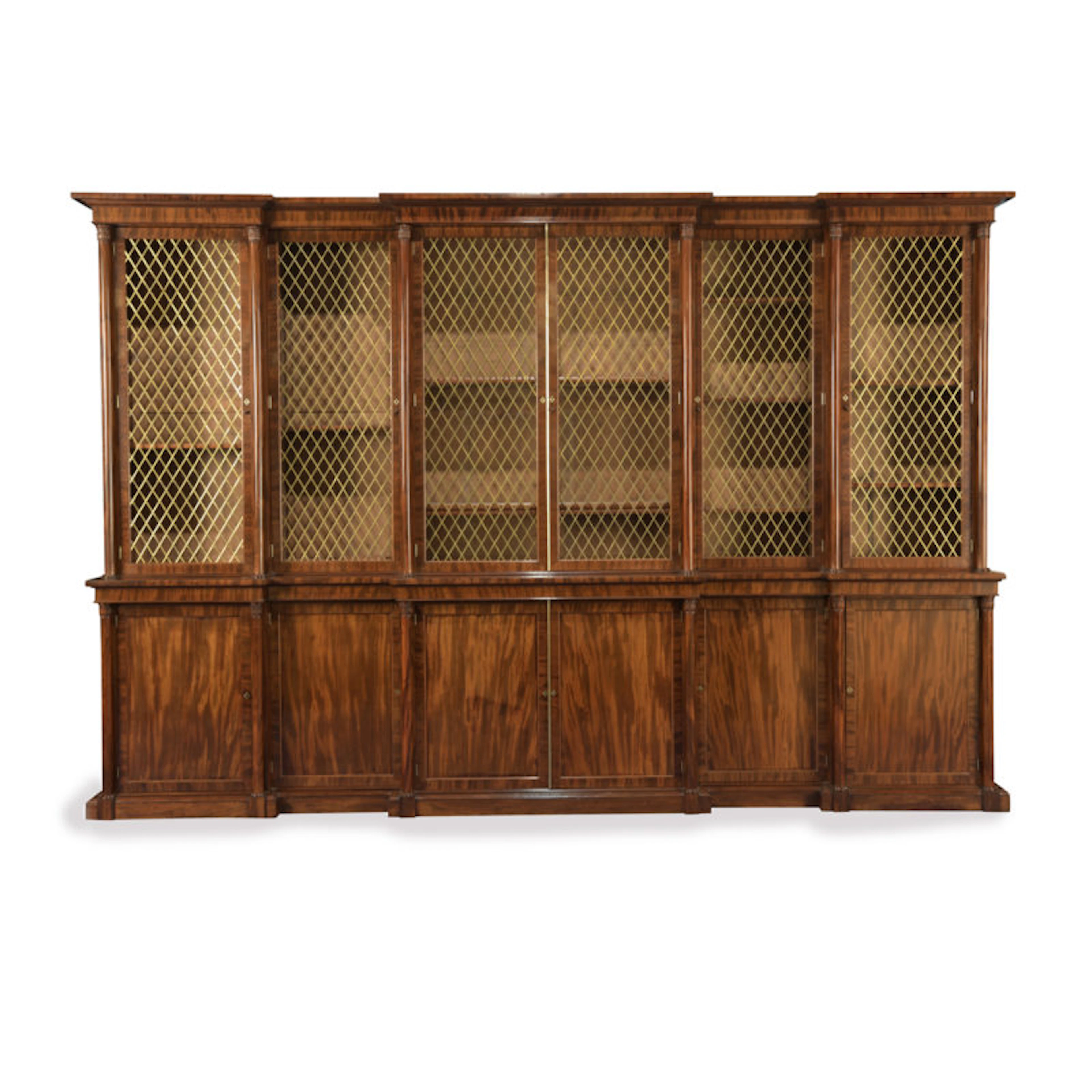 A large and impressive late Regency six door mahogany bookcase attributed