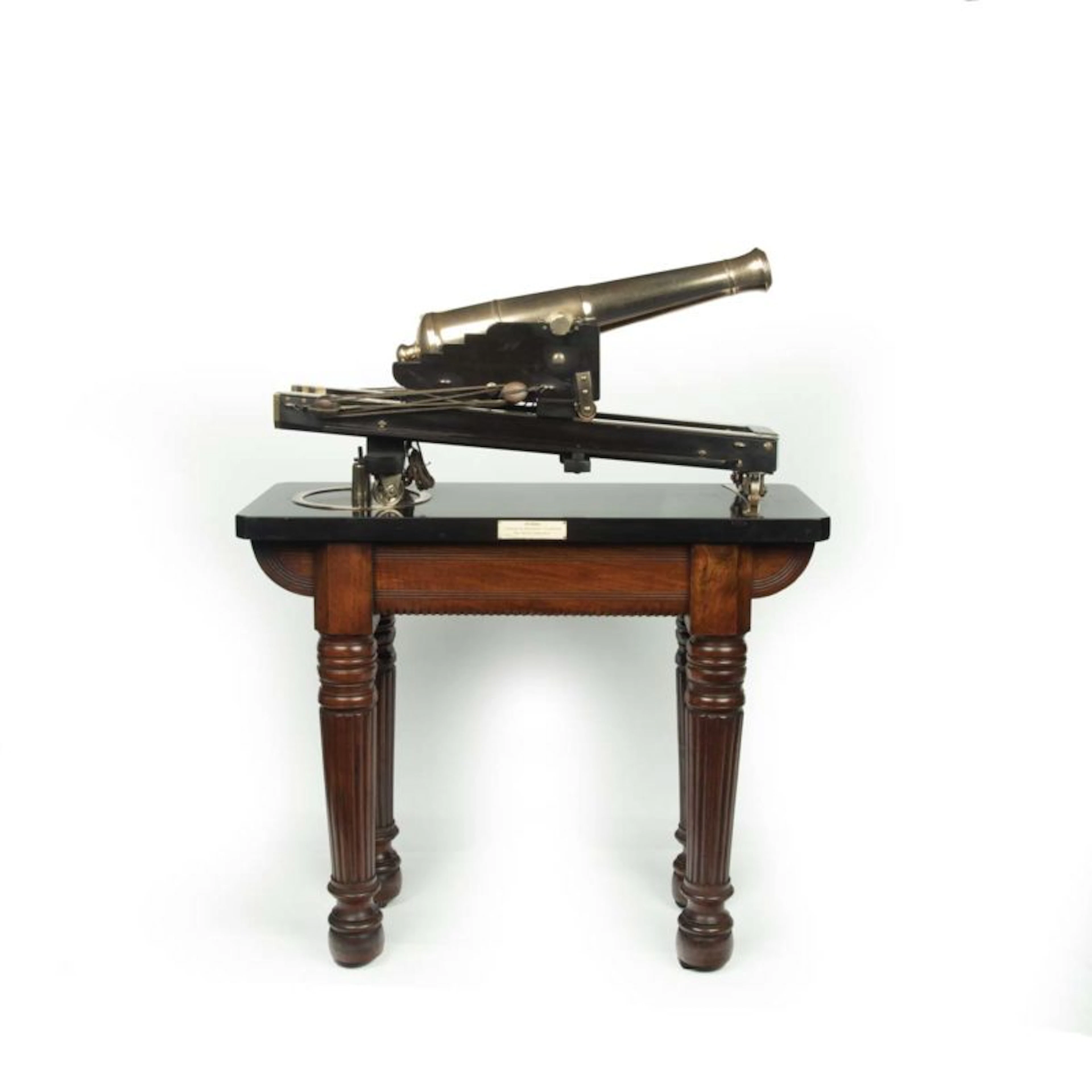 A demonstration or museum model of a civil defence traversing cannon